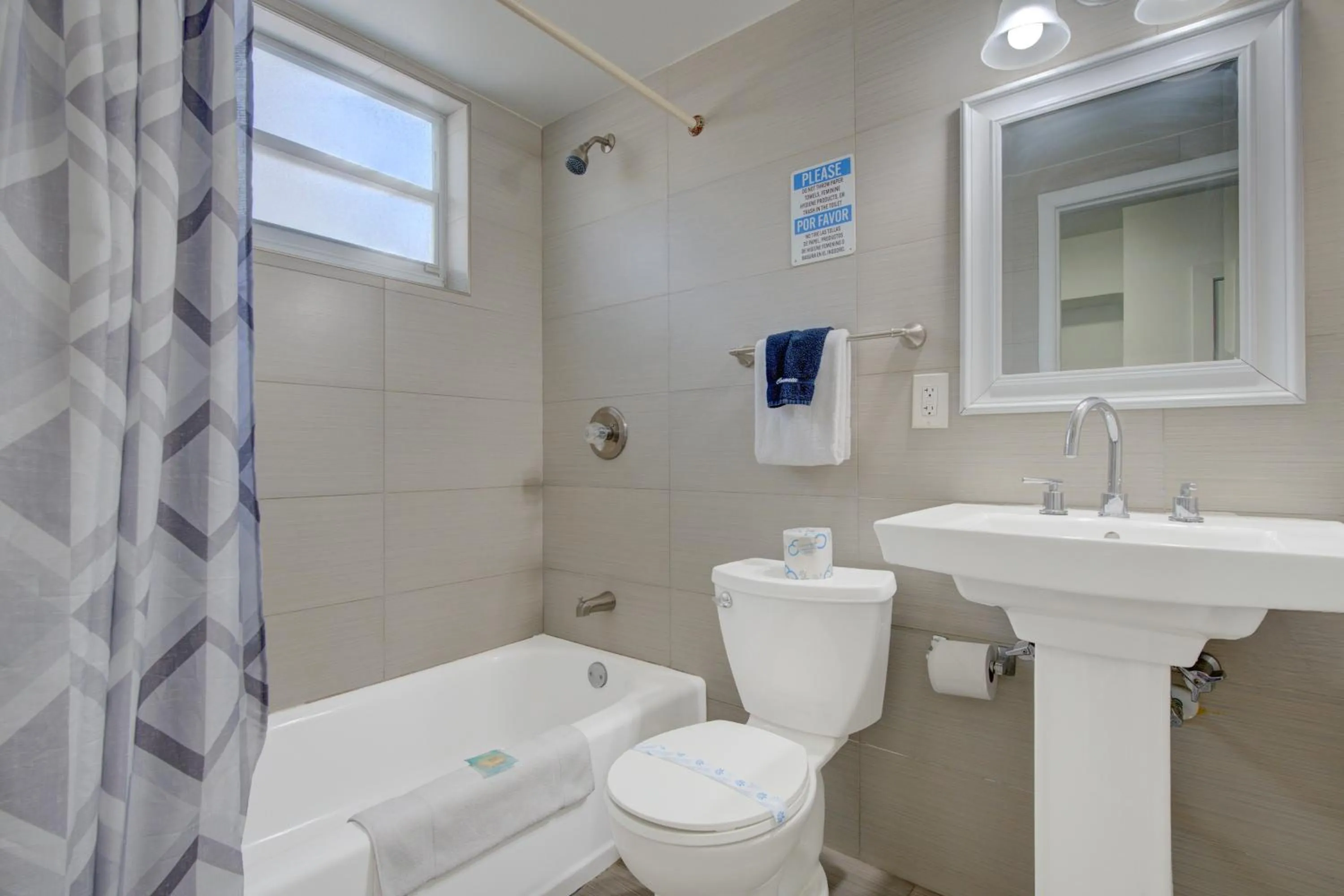 Bathroom in Leeward Motel By Capital O North Miami Beachside