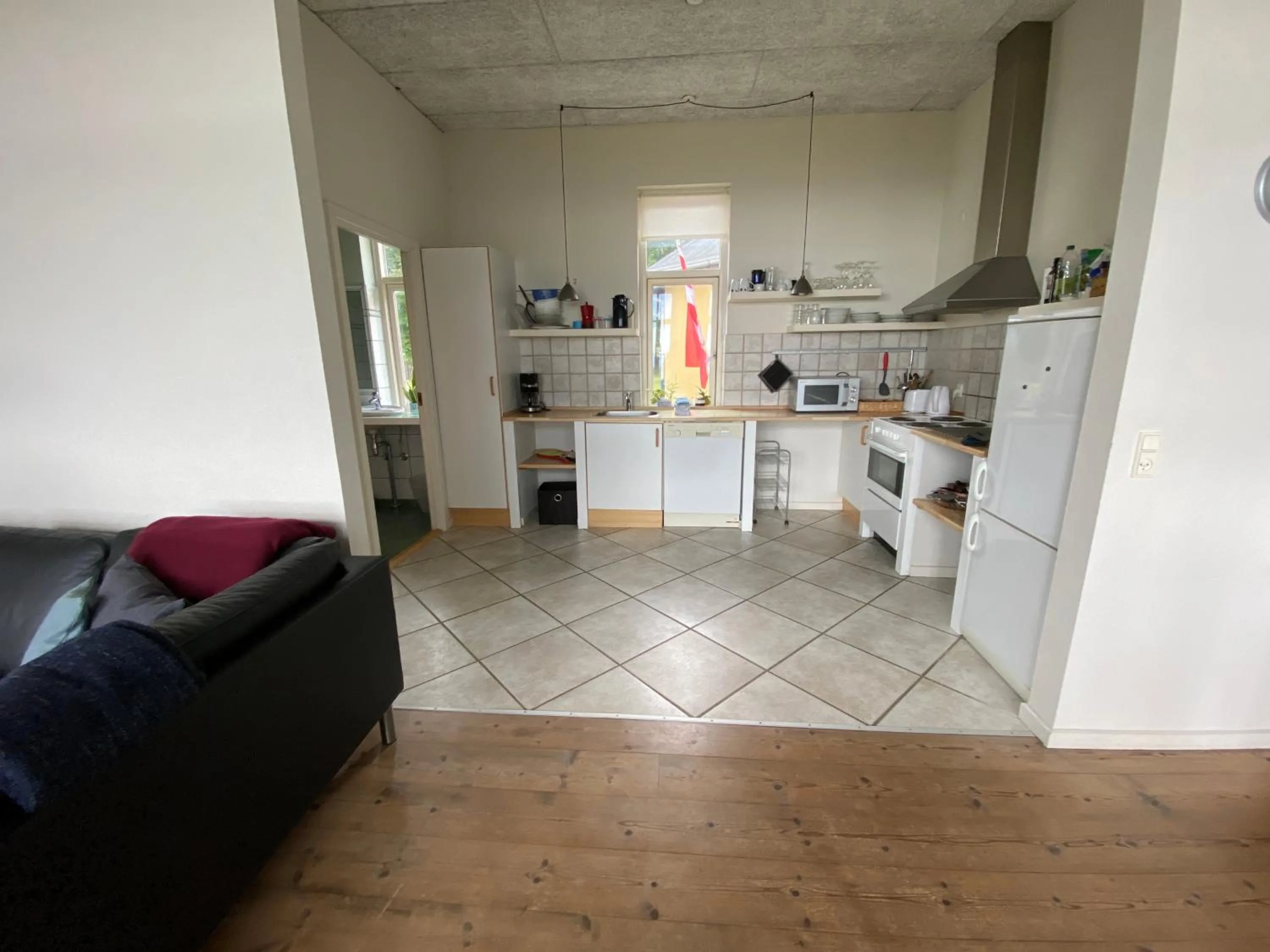 Kitchen or kitchenette in Skærven Beachfront Apartments and Cottage