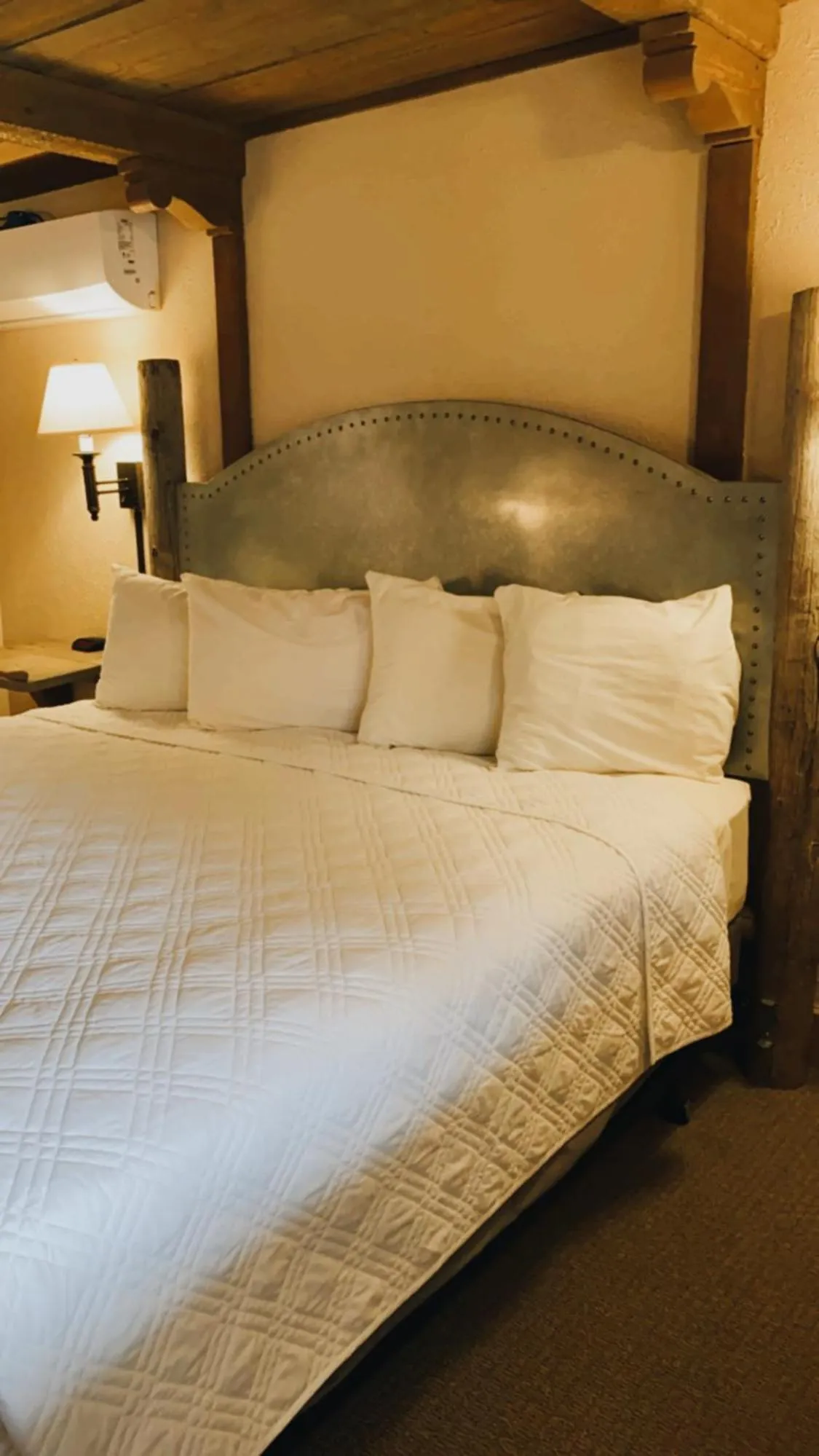 Bed in Chama Trails Motel