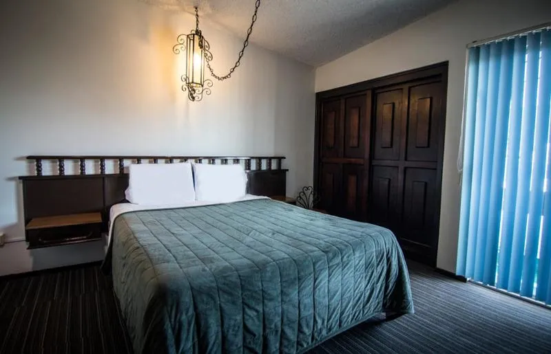 Bed in Hotel Suites Malena