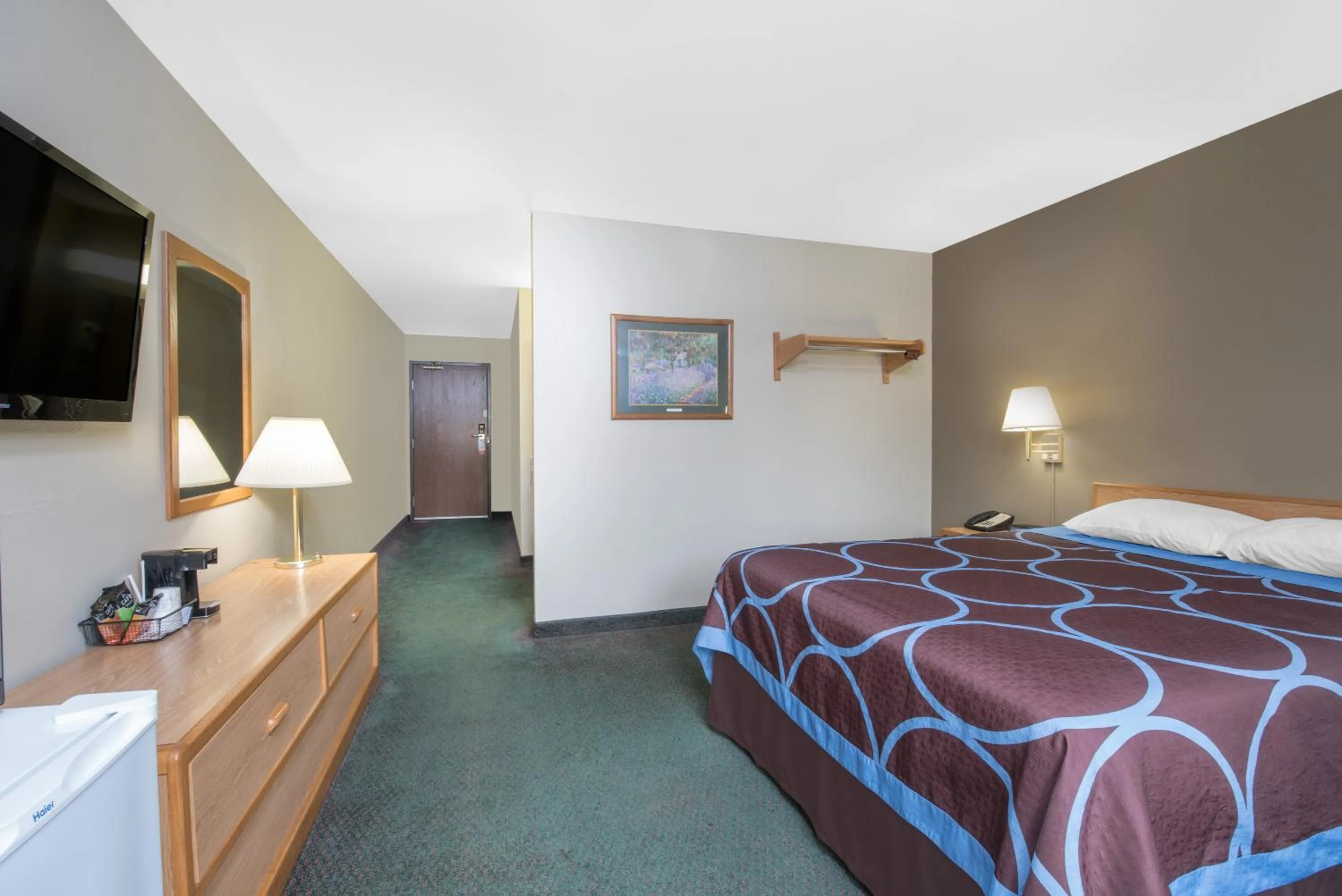 Bed in Northwoods Inn and Suites