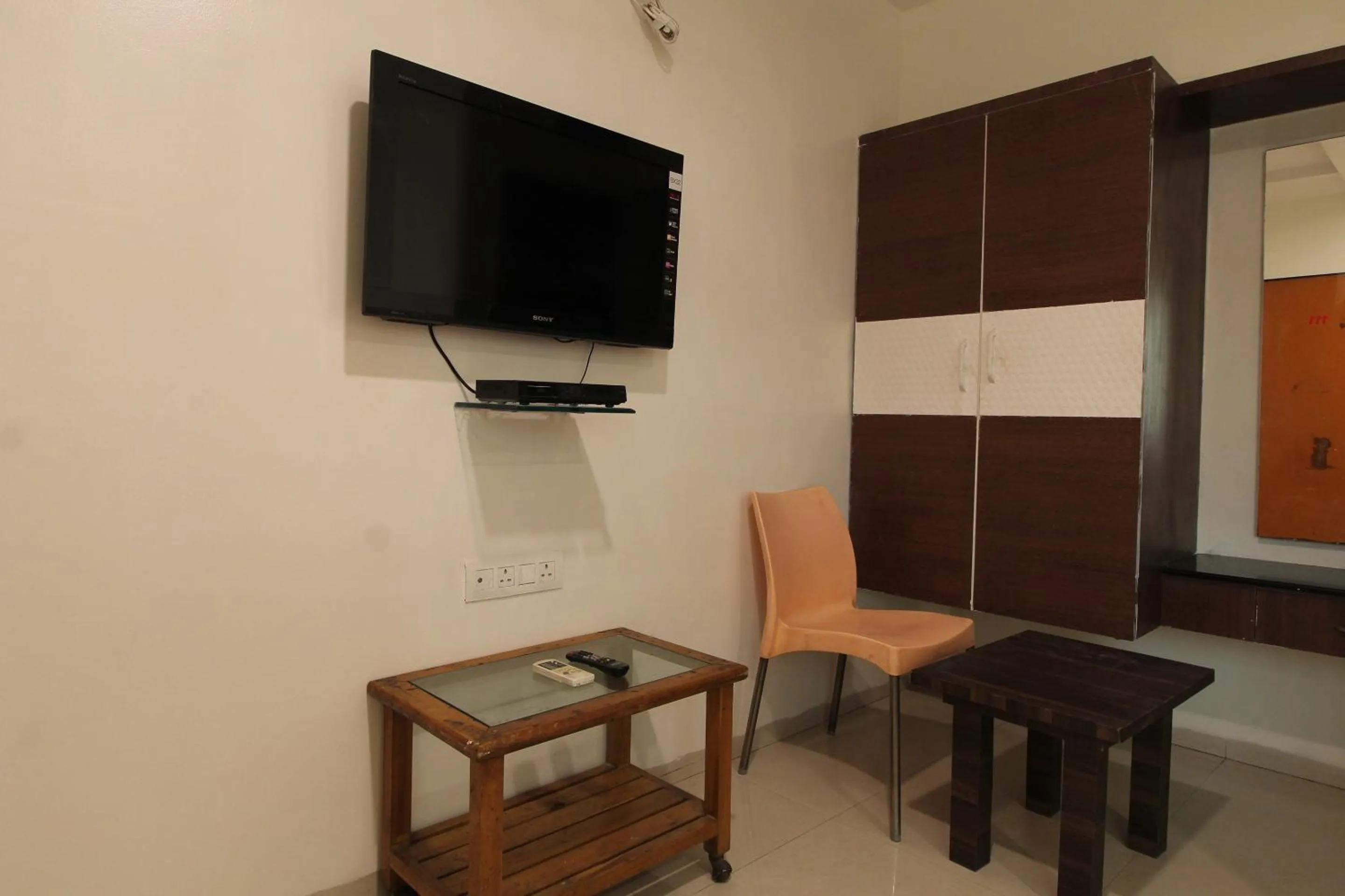 Bedroom in Hotel O New Pune