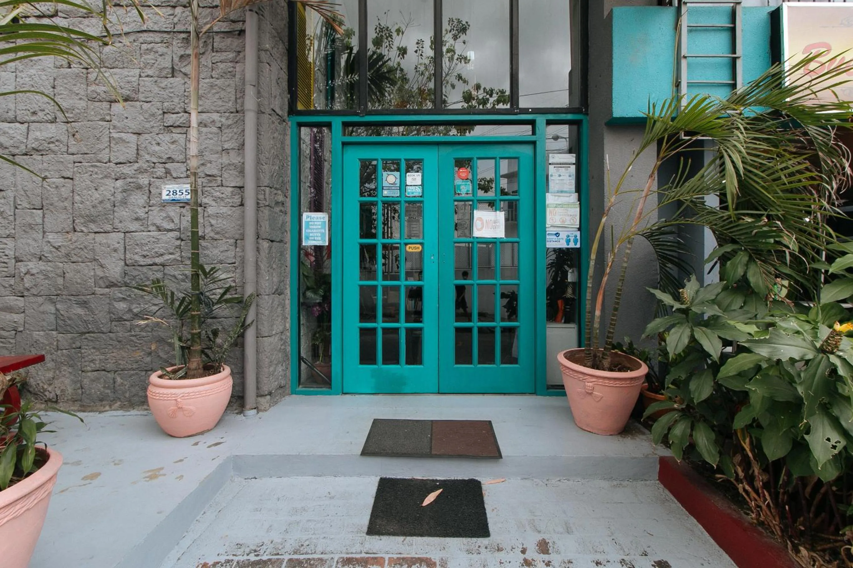 Facade/entrance in RedDoorz Plus at BGC near St Lukes