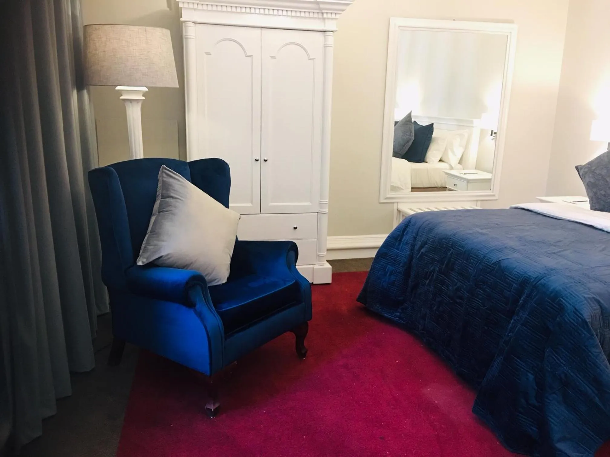 Bed in Rand Club Suites