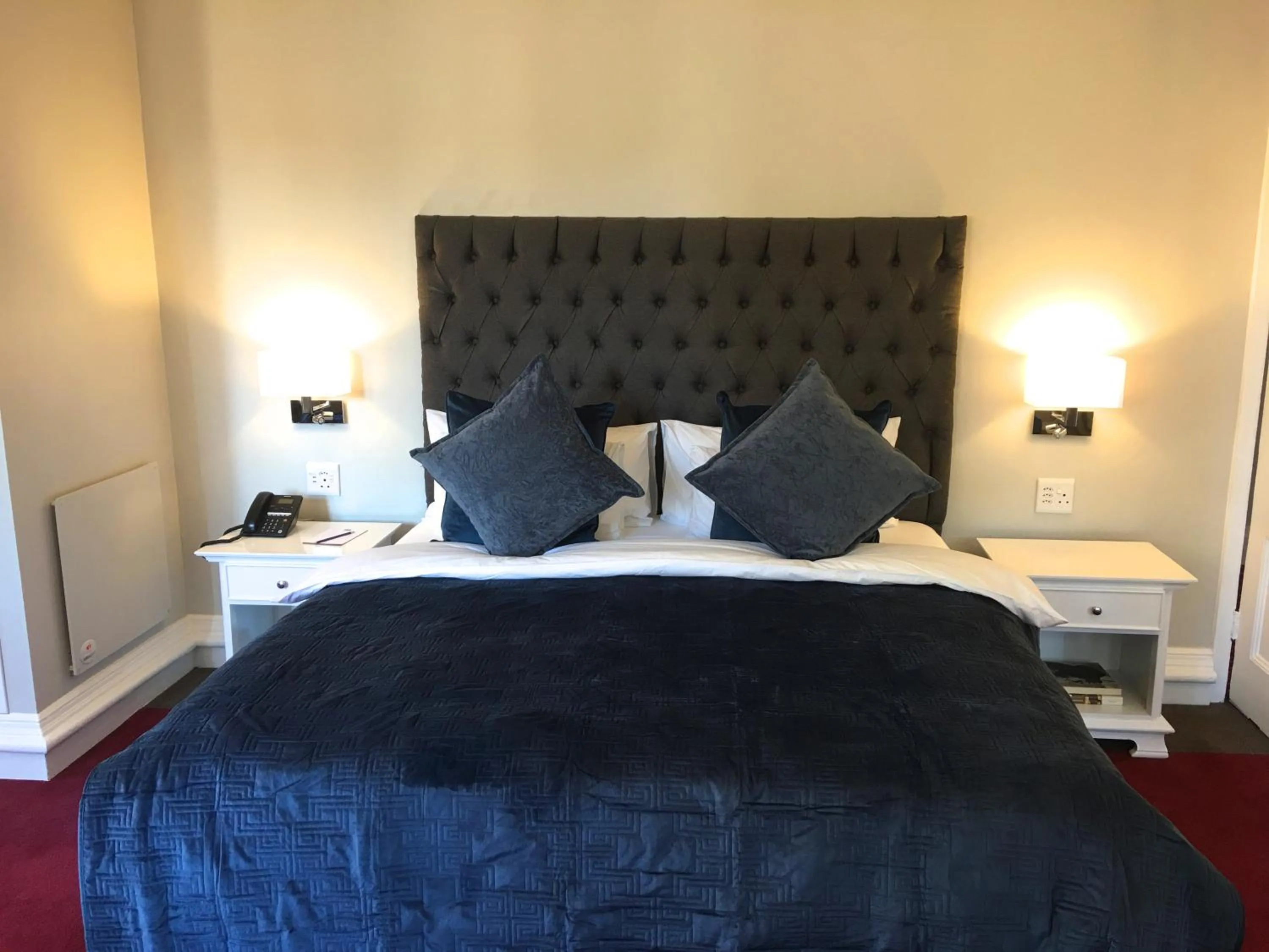 Bed in Rand Club Suites