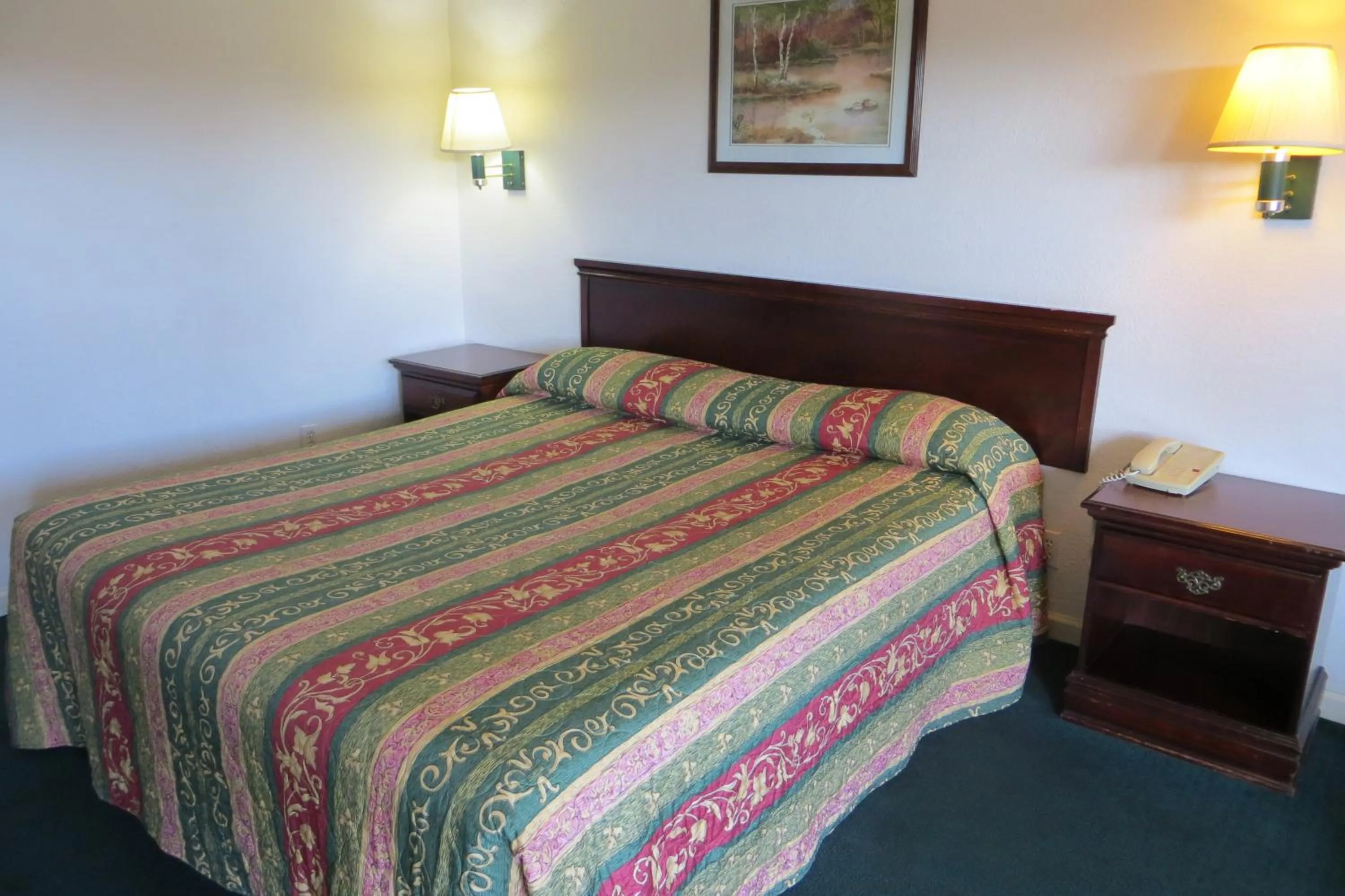 Bed in Capri Motel