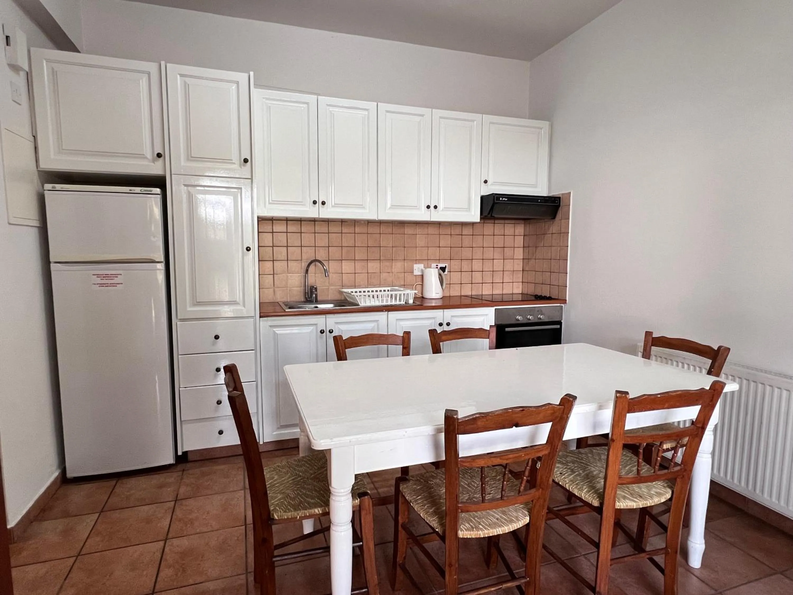 Kitchen or kitchenette in POED Residences