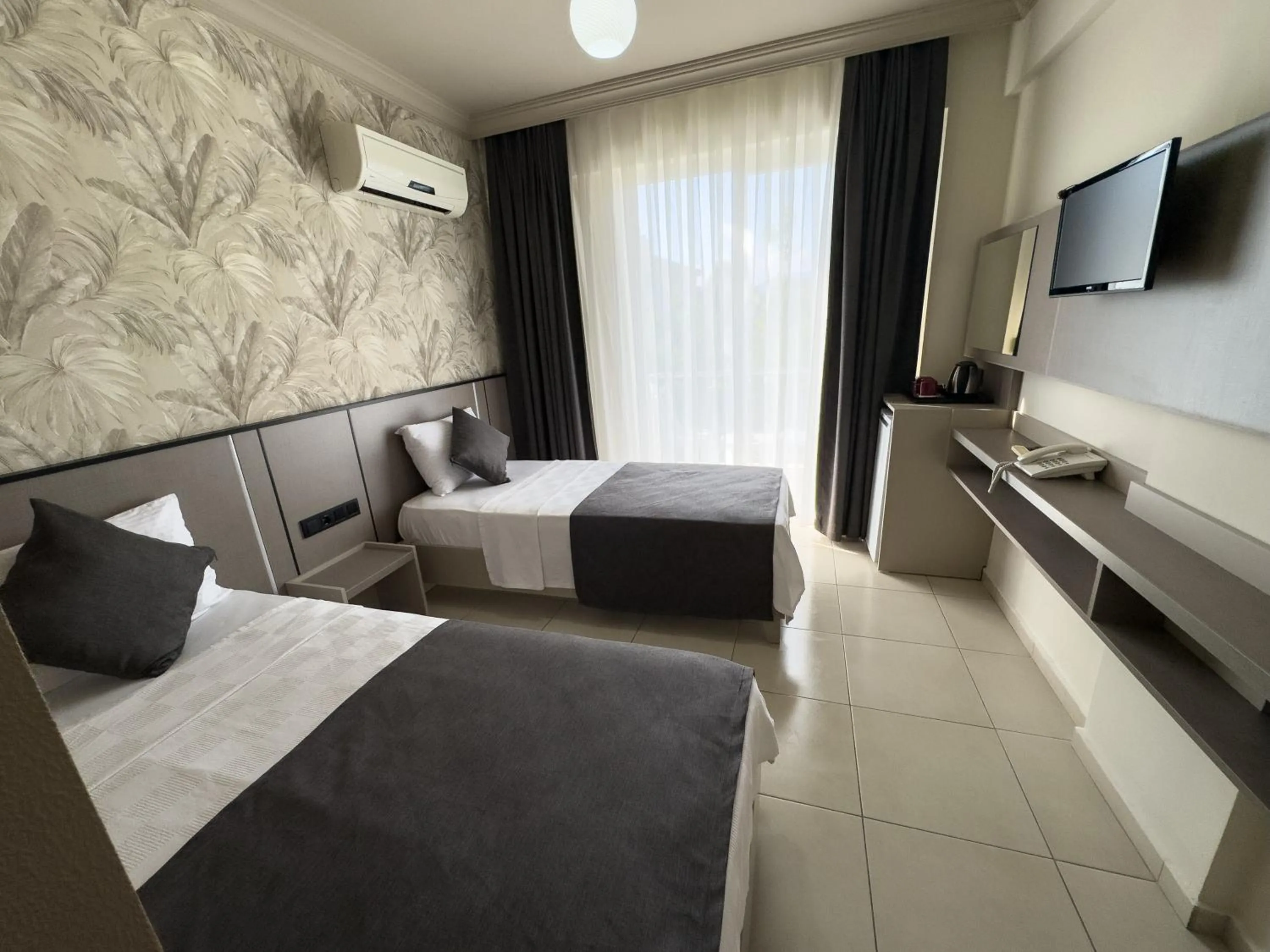 Bed in Sardunya Hotel