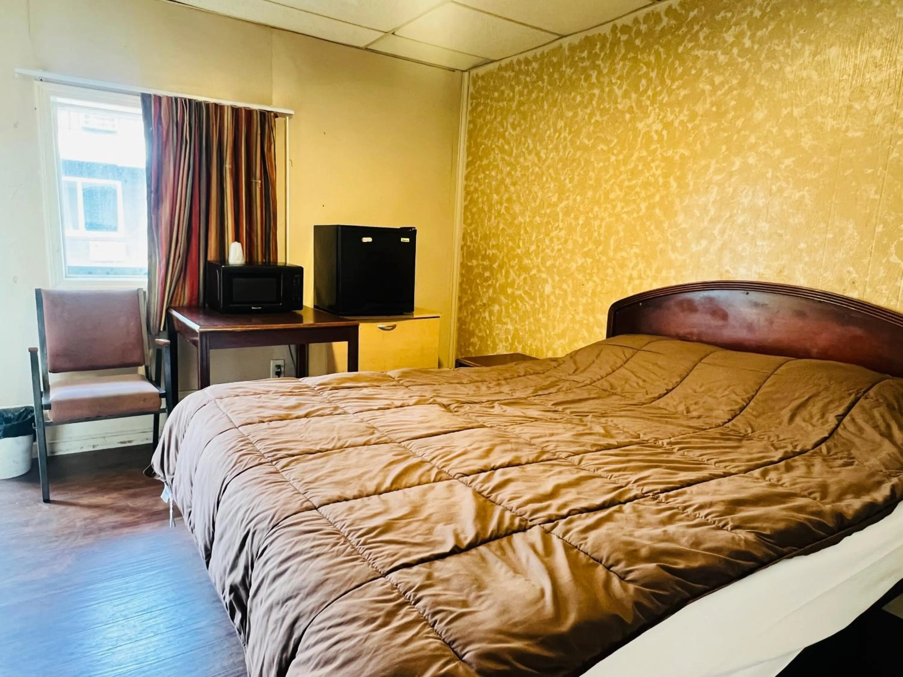 Bedroom in Hotel O East Hemphill Burton-Flint