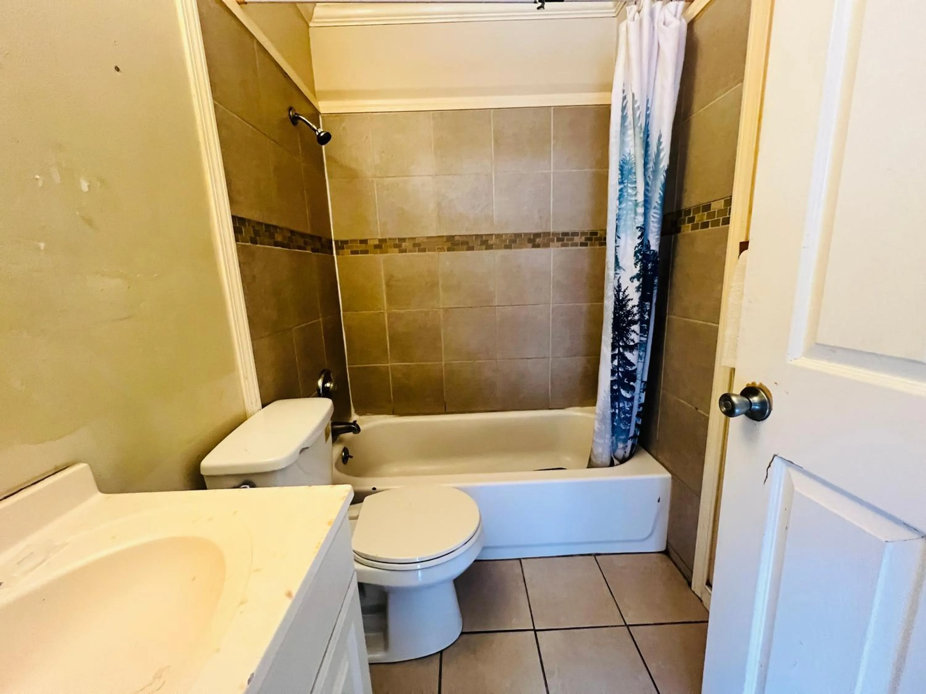 Bathroom in Hotel O East Hemphill Burton-Flint