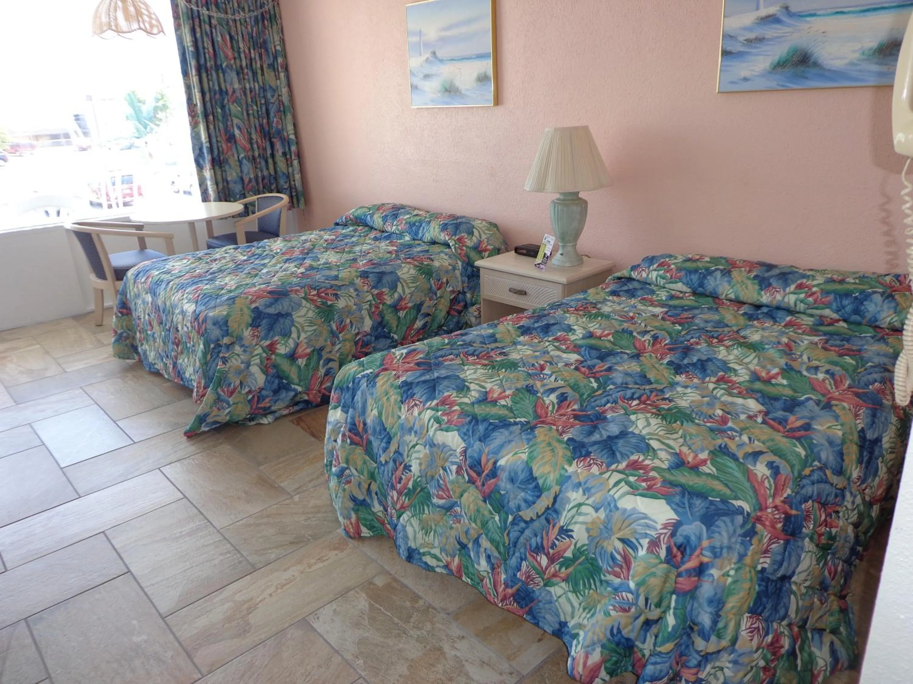 Bed in Quarterdeck Motel