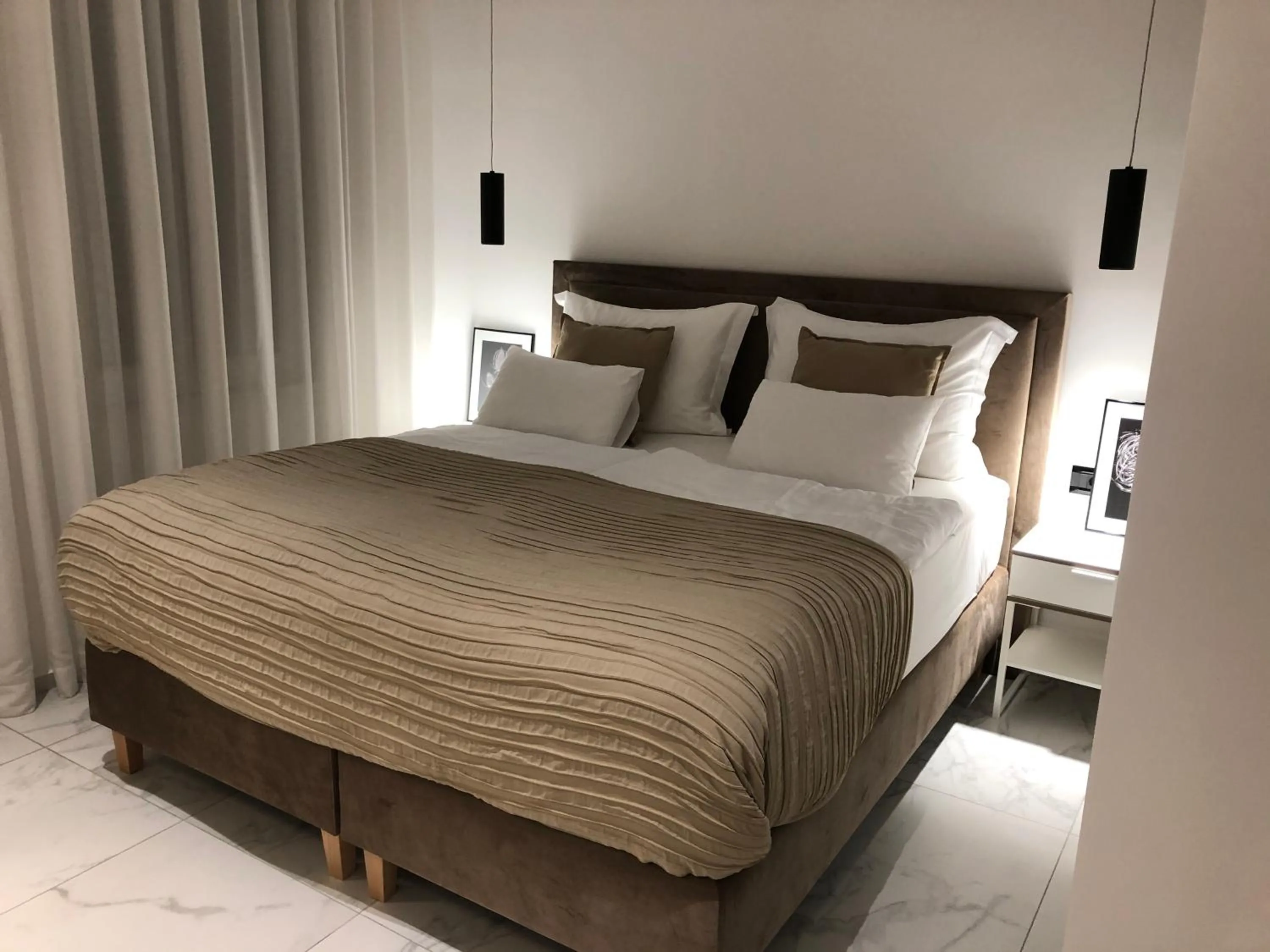 Bed in Lifestyle Apartments