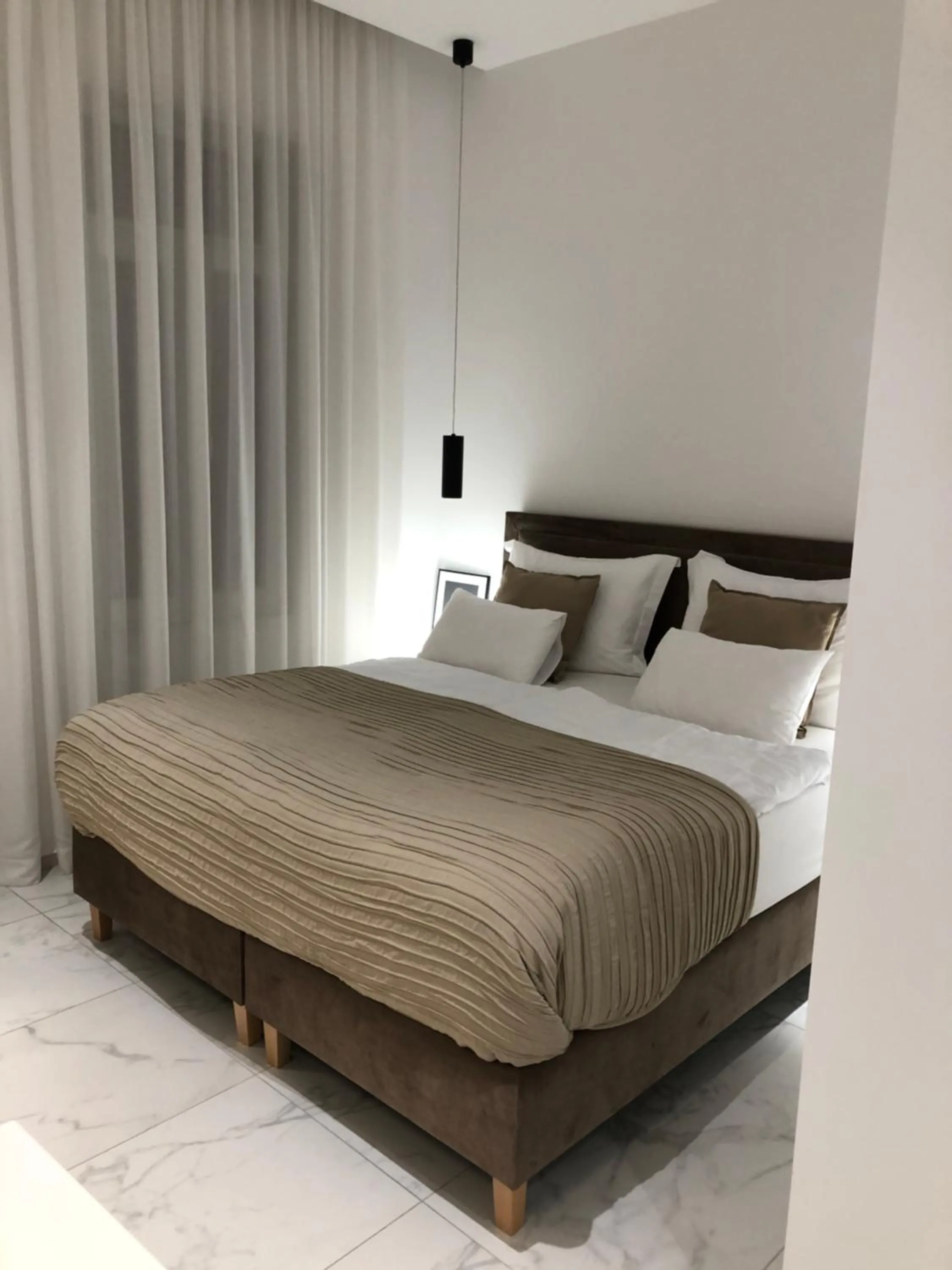 Bed in Lifestyle Apartments