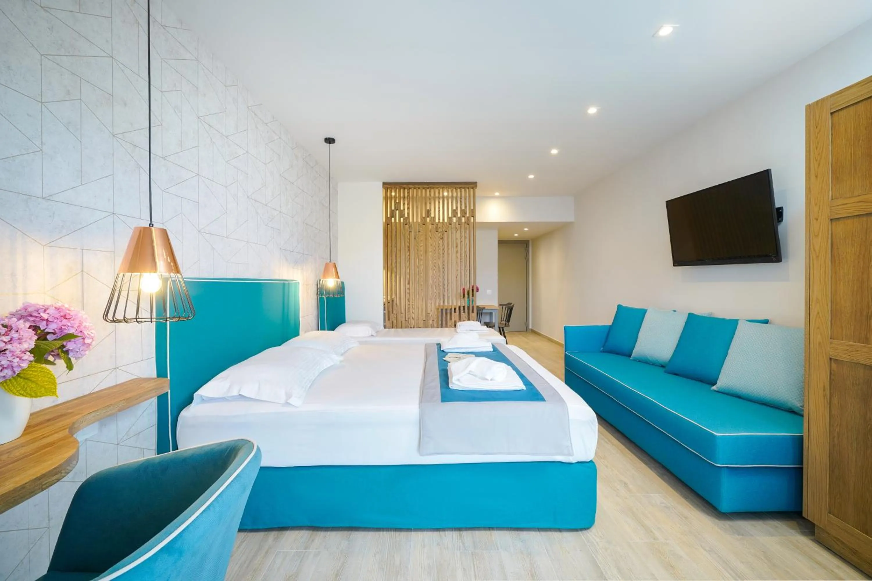 Photo of the whole room, Bed in Iliomagic Luxury Suites Thassos