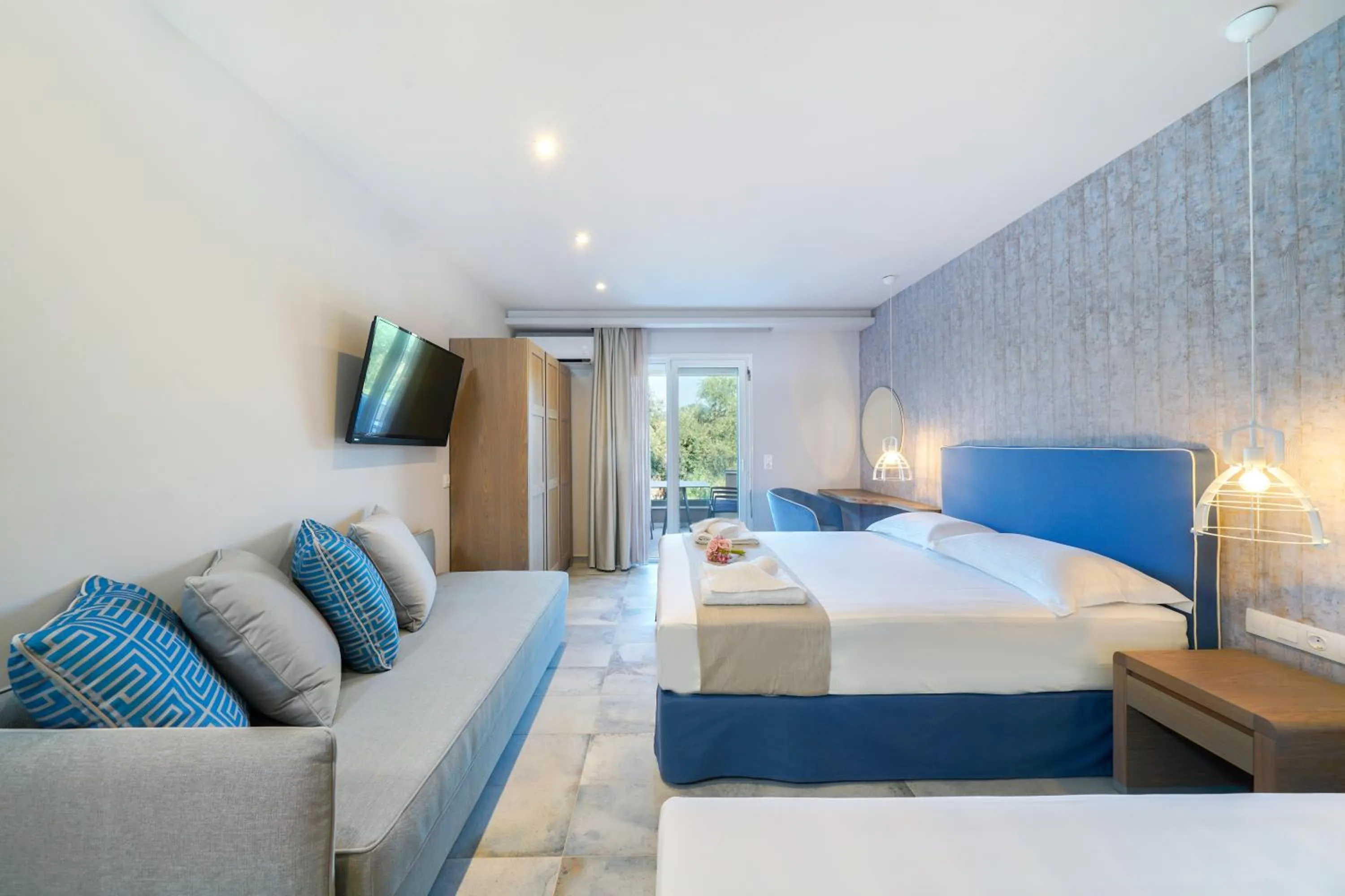 Photo of the whole room, Bed in Iliomagic Luxury Suites Thassos