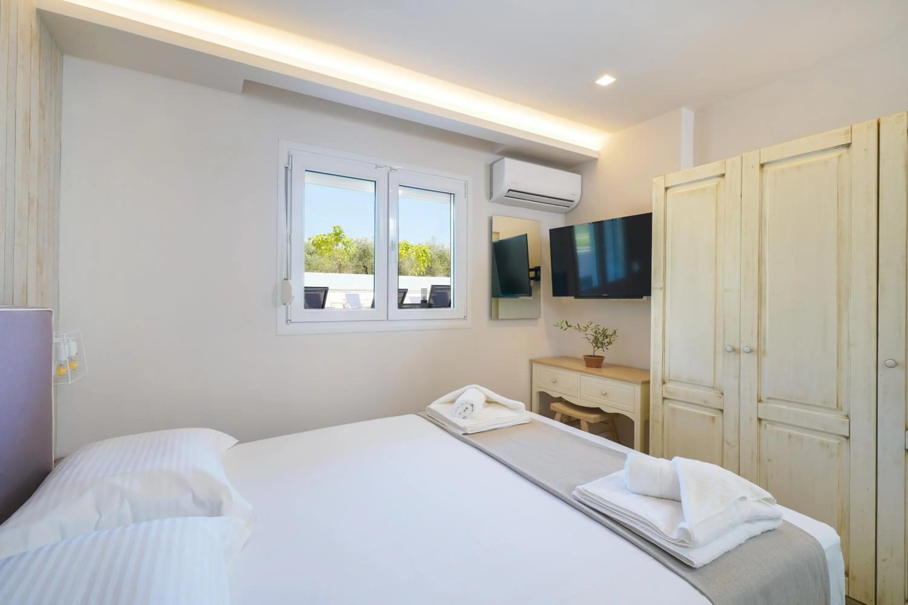 Bed in Iliomagic Luxury Suites Thassos
