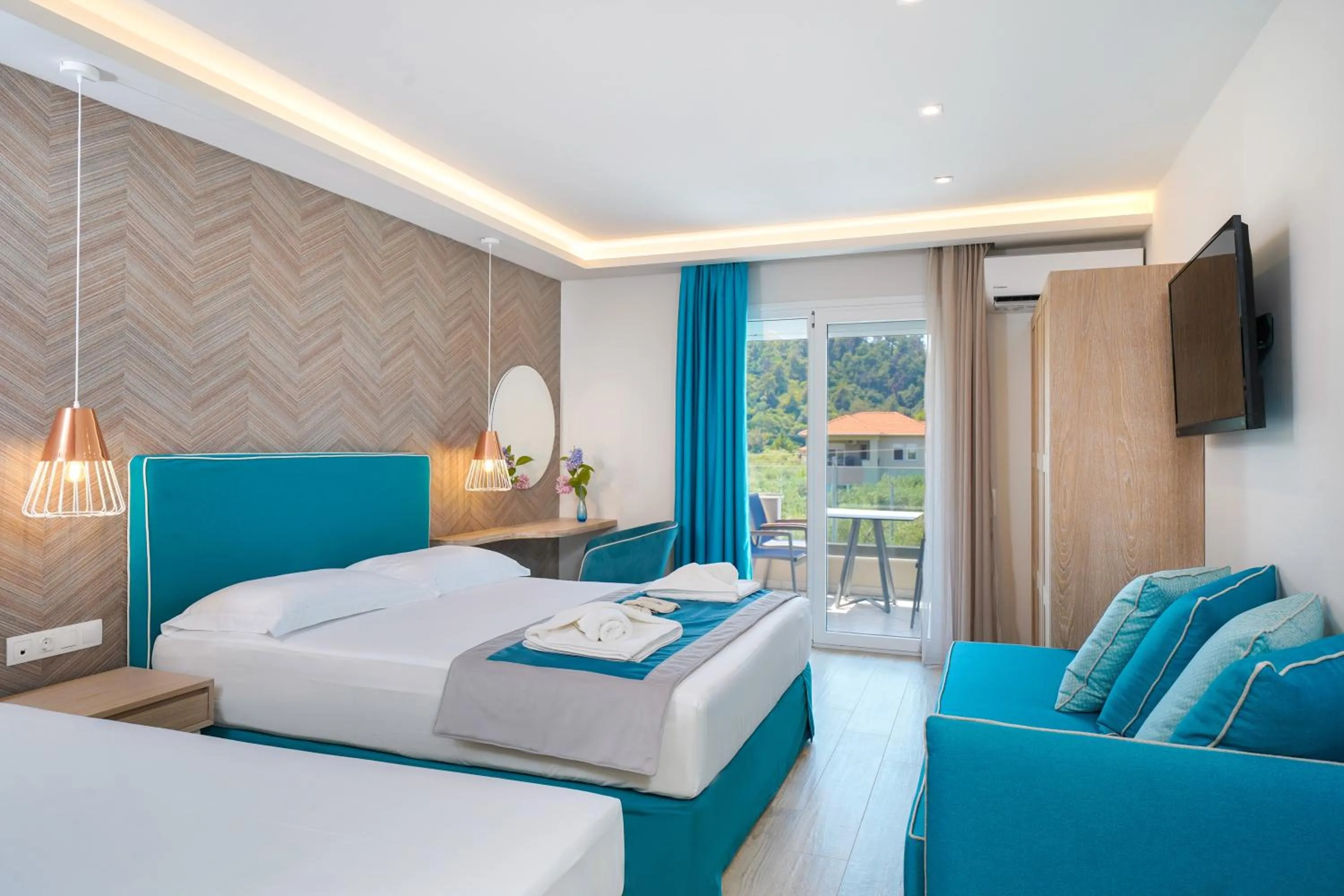 Photo of the whole room, Bed in Iliomagic Luxury Suites Thassos