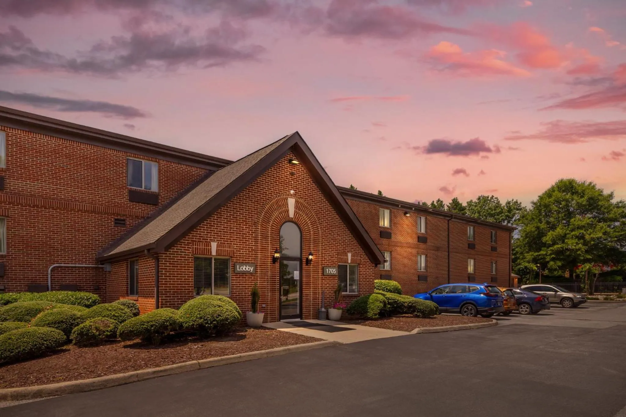 Facade/entrance in HomeTowne Studios & Suites by Red Roof Greensboro