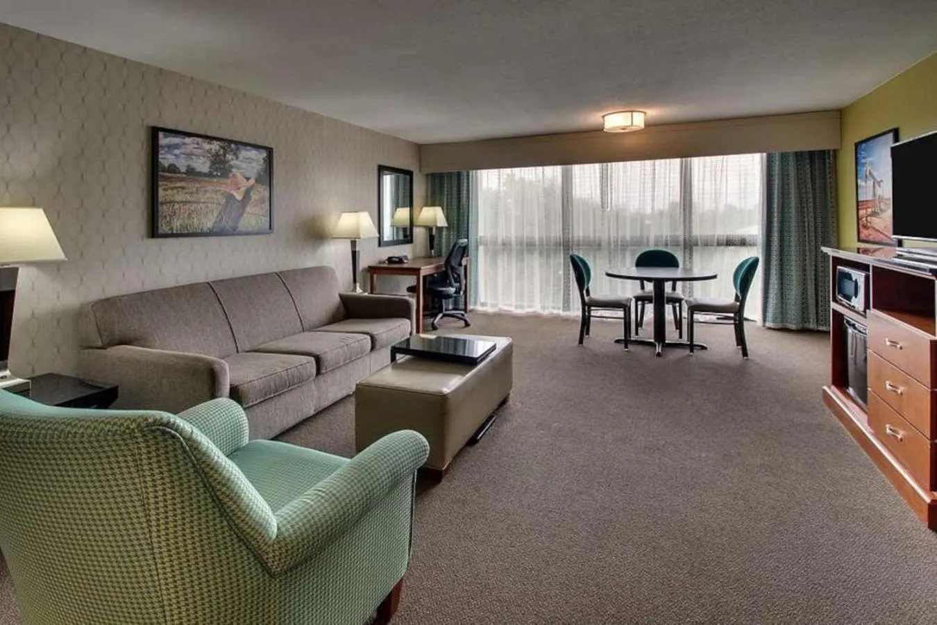 Living room in Heritage Inn Suites Houston Sugar Land, Trademark by Wyndham