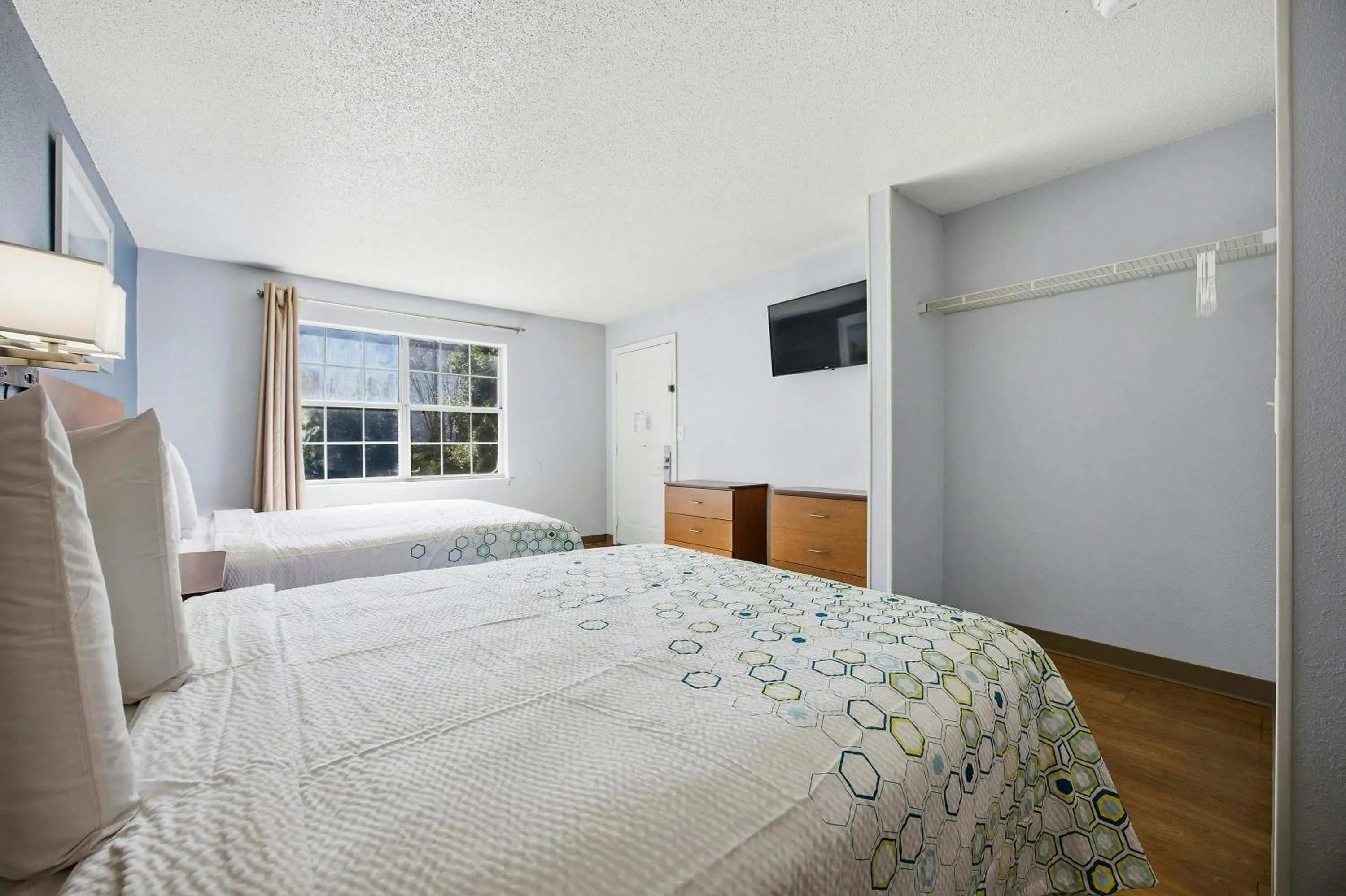 Photo of the whole room, Bed in HomeTowne Studios by Red Roof Atlanta - Peachtree Corners
