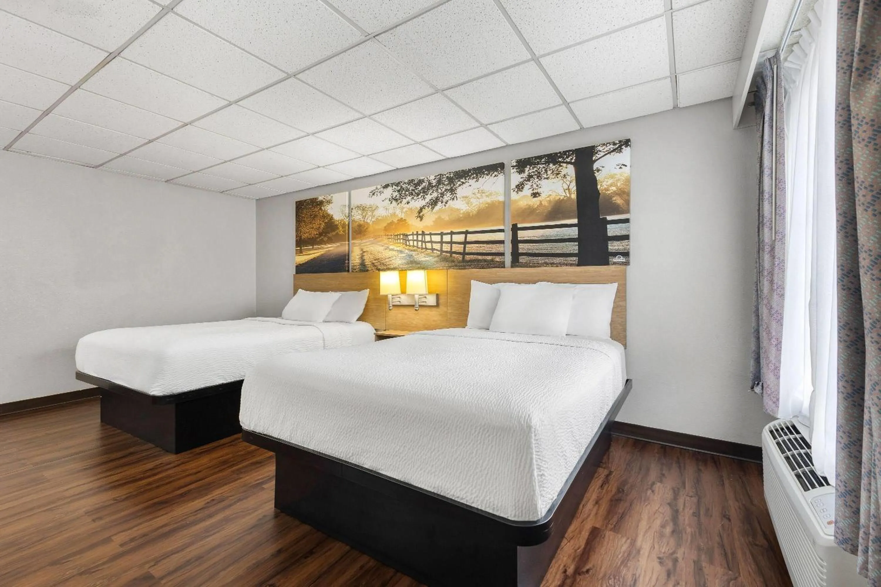 Bed in Days Inn by Wyndham Madisonville