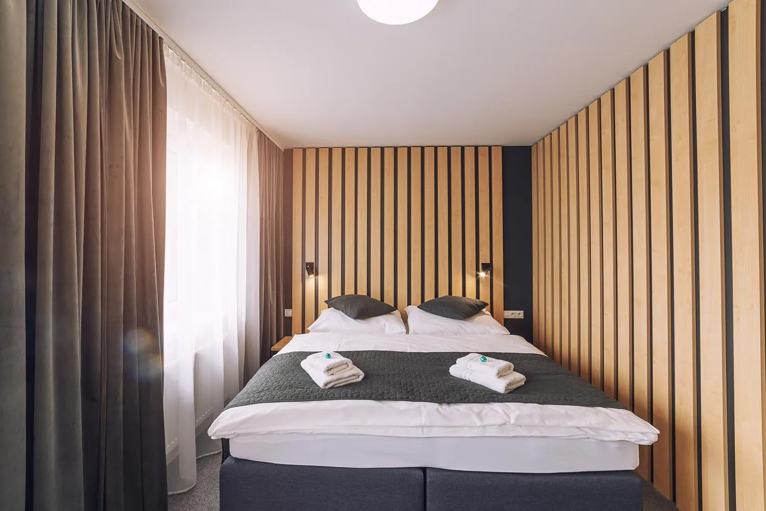 Bedroom, Bed in TIMEOUT City Hotel