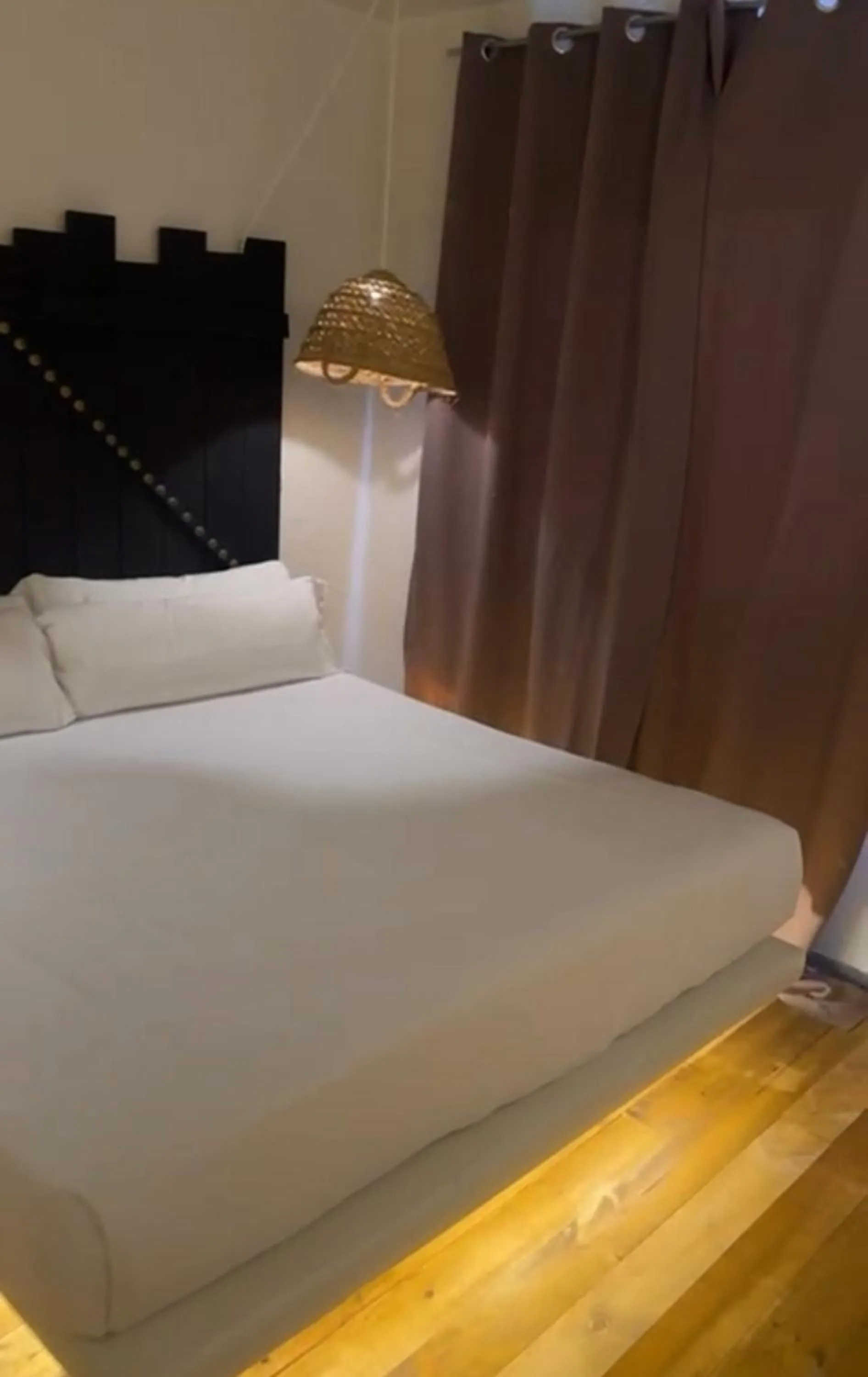Bed in PAIISE Hotels
