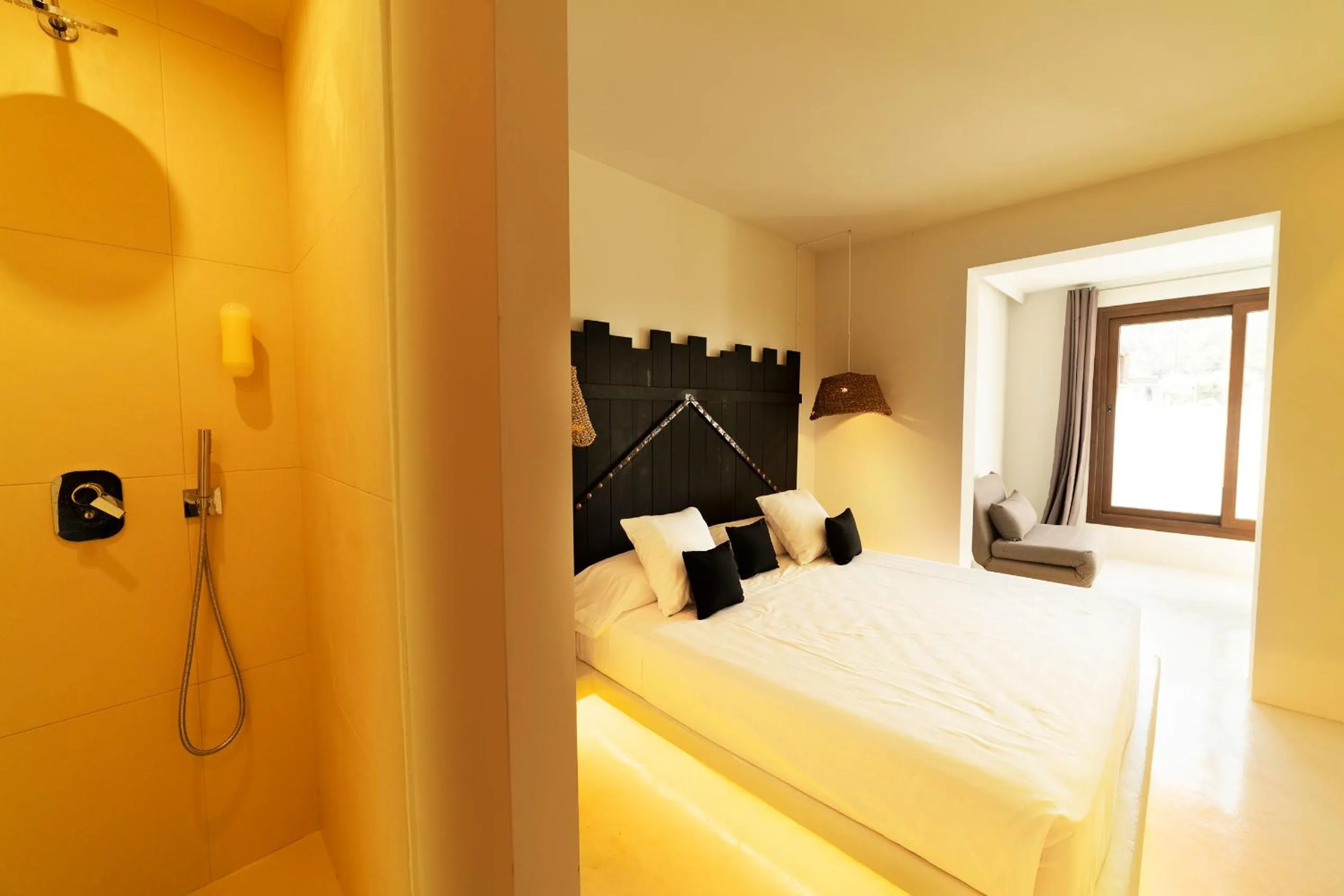 Bed in PAIISE Hotels