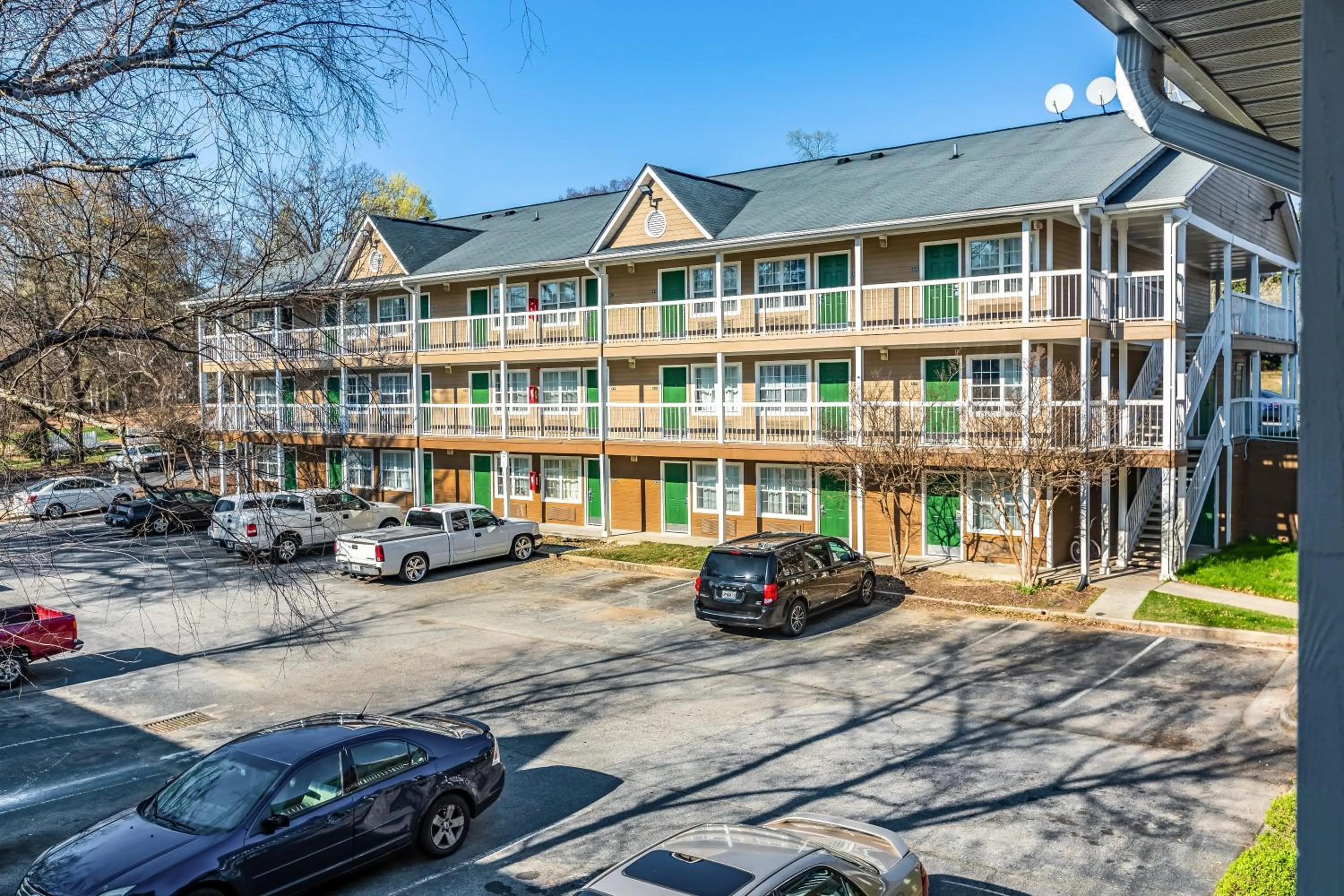 Property building in HomeTowne Studios by Red Roof Atlanta NE - Downtown Norcross