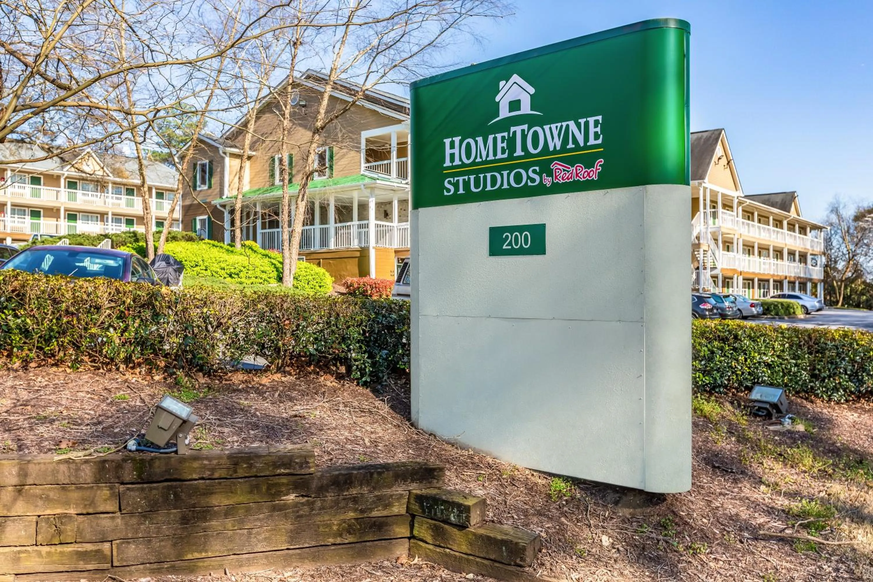 Property building in HomeTowne Studios by Red Roof Atlanta NE - Downtown Norcross
