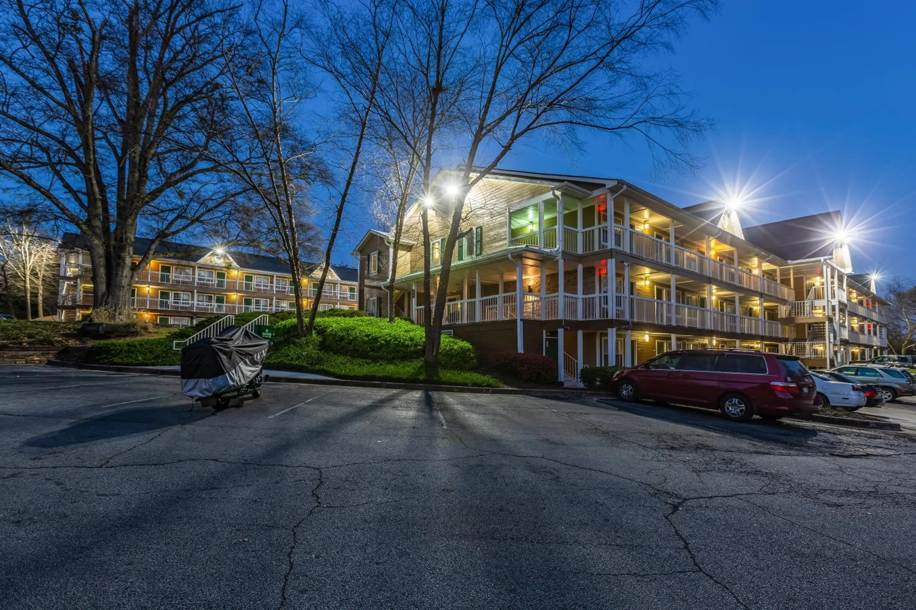 Property building in HomeTowne Studios by Red Roof Atlanta NE - Downtown Norcross