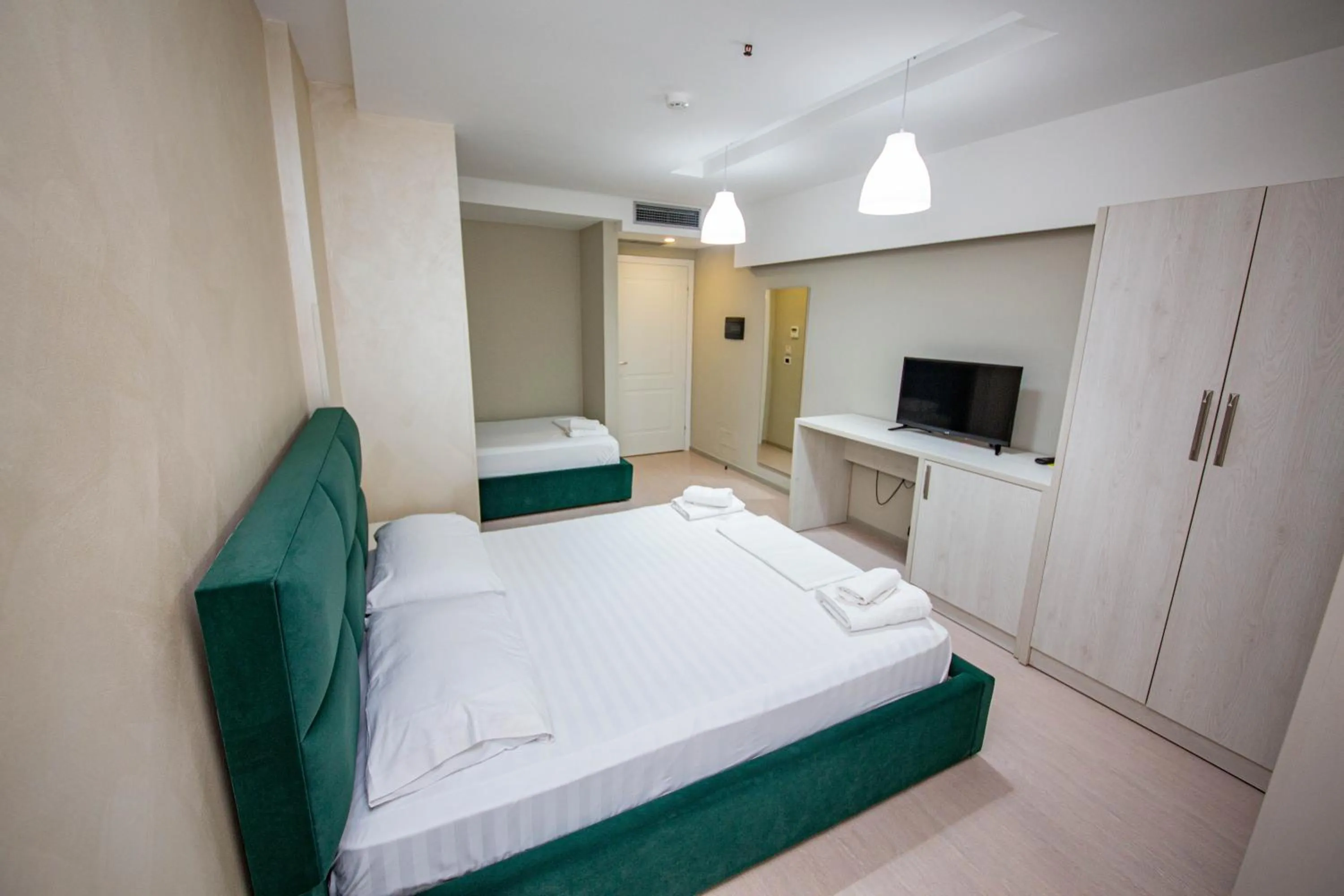 Triple Room with Balcony in Hotel Miki