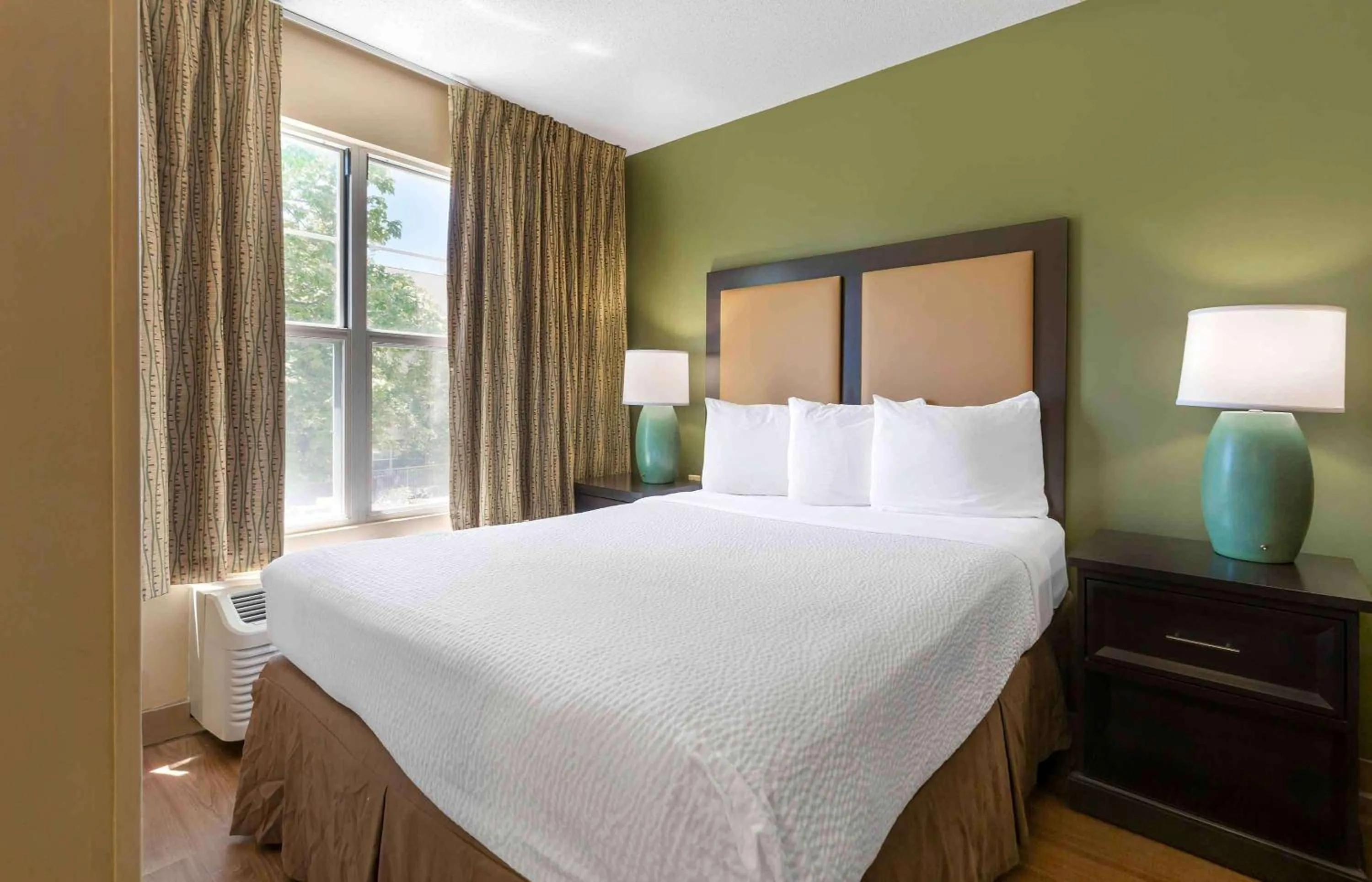 Bedroom, Bed in Extended Stay America Suites - Raleigh - RTP - 4919 Miami Blvd