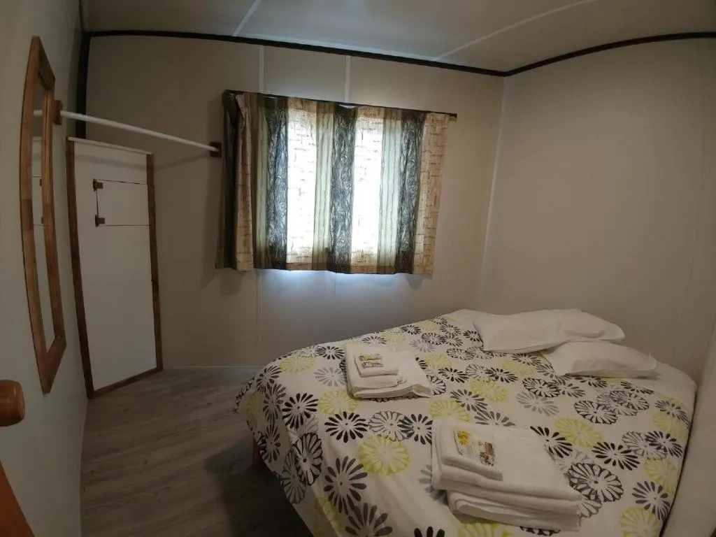 Bed in Pine Lake View Lodge