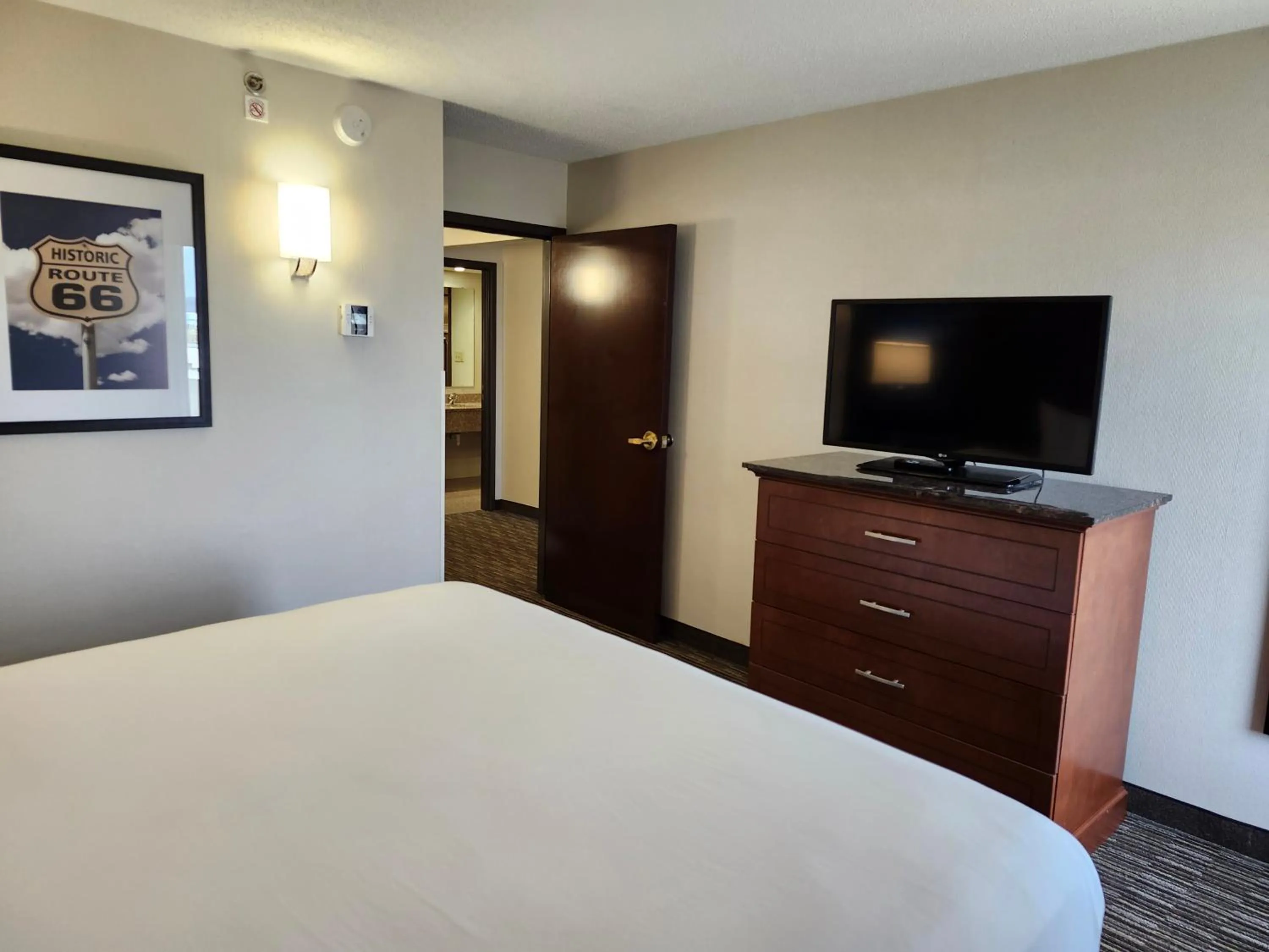 Bed in Heritage Inn & Suites St Louis Fenton, Trademark by Wyndham