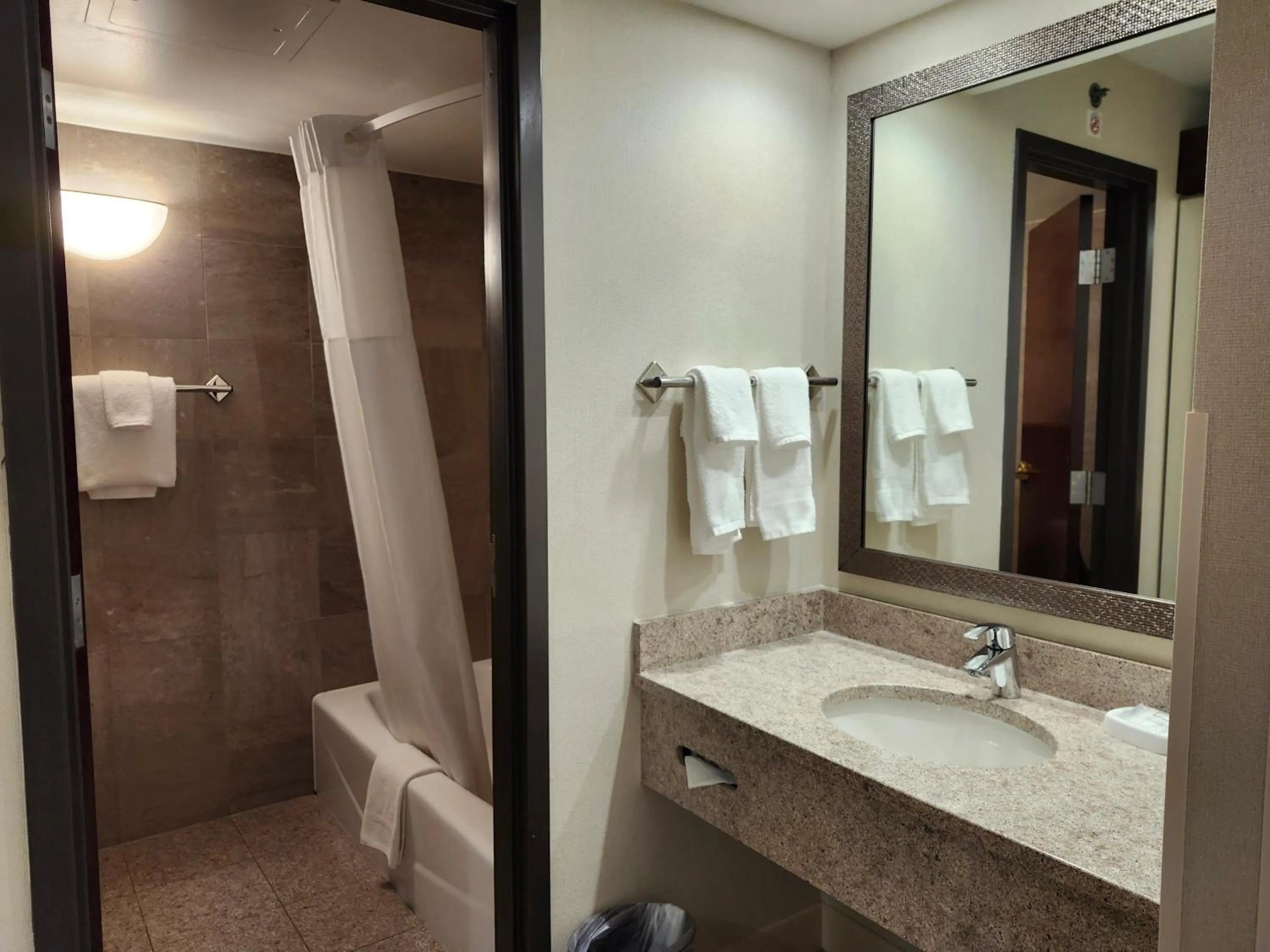 Bathroom in Heritage Inn & Suites St Louis Fenton, Trademark by Wyndham