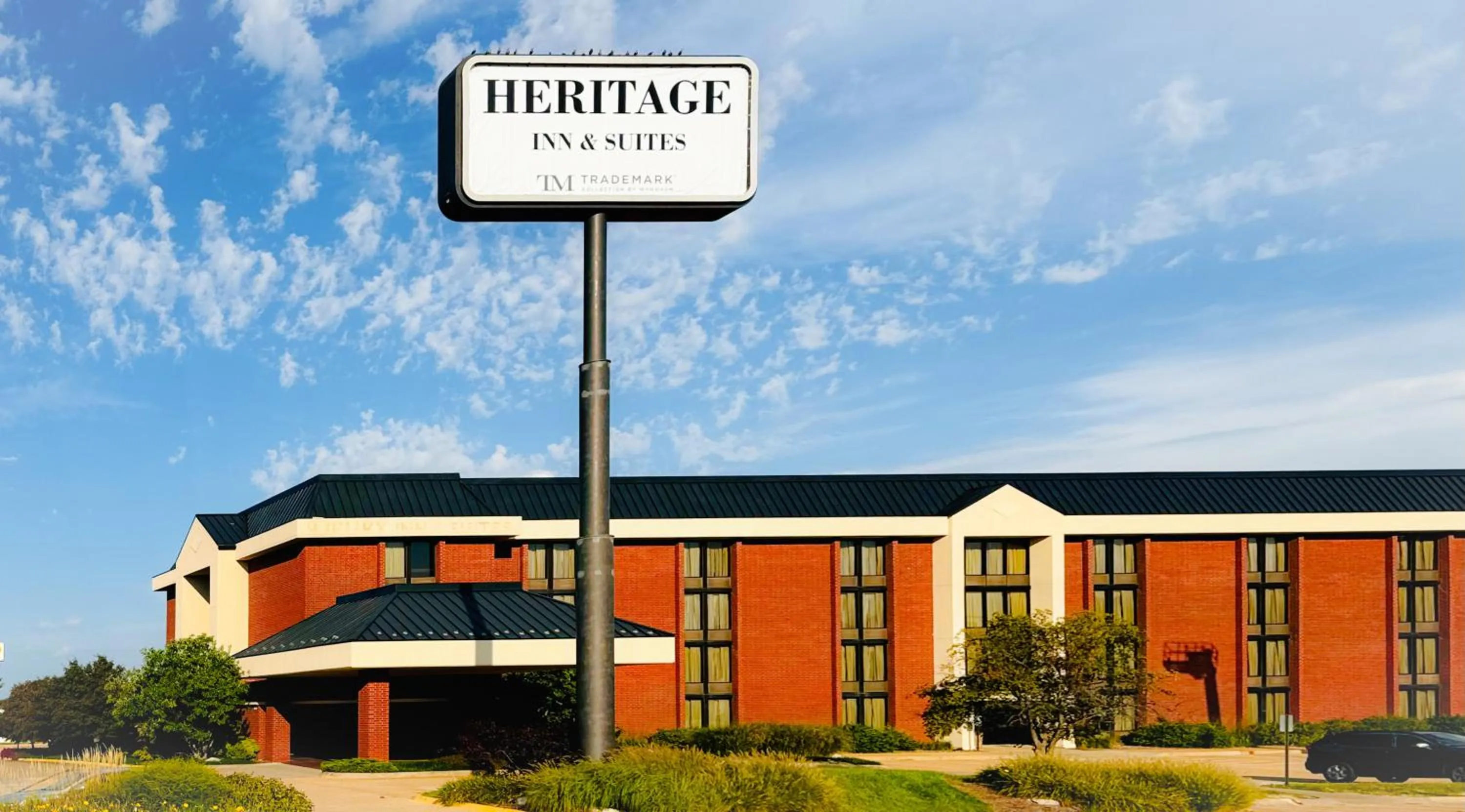 Property building in Heritage Inn & Suites St Louis Fenton, Trademark by Wyndham