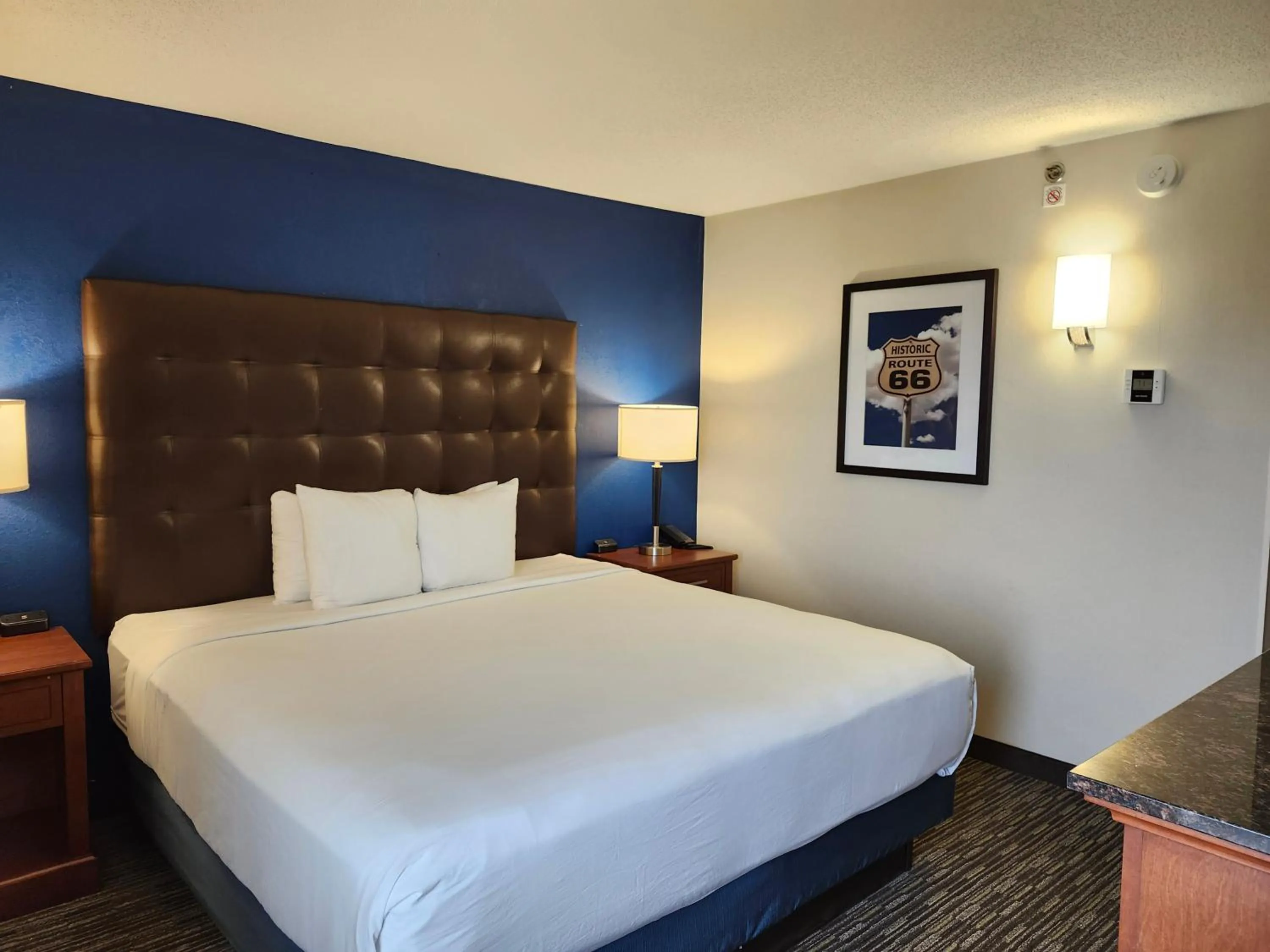 Bed in Heritage Inn & Suites St Louis Fenton, Trademark by Wyndham