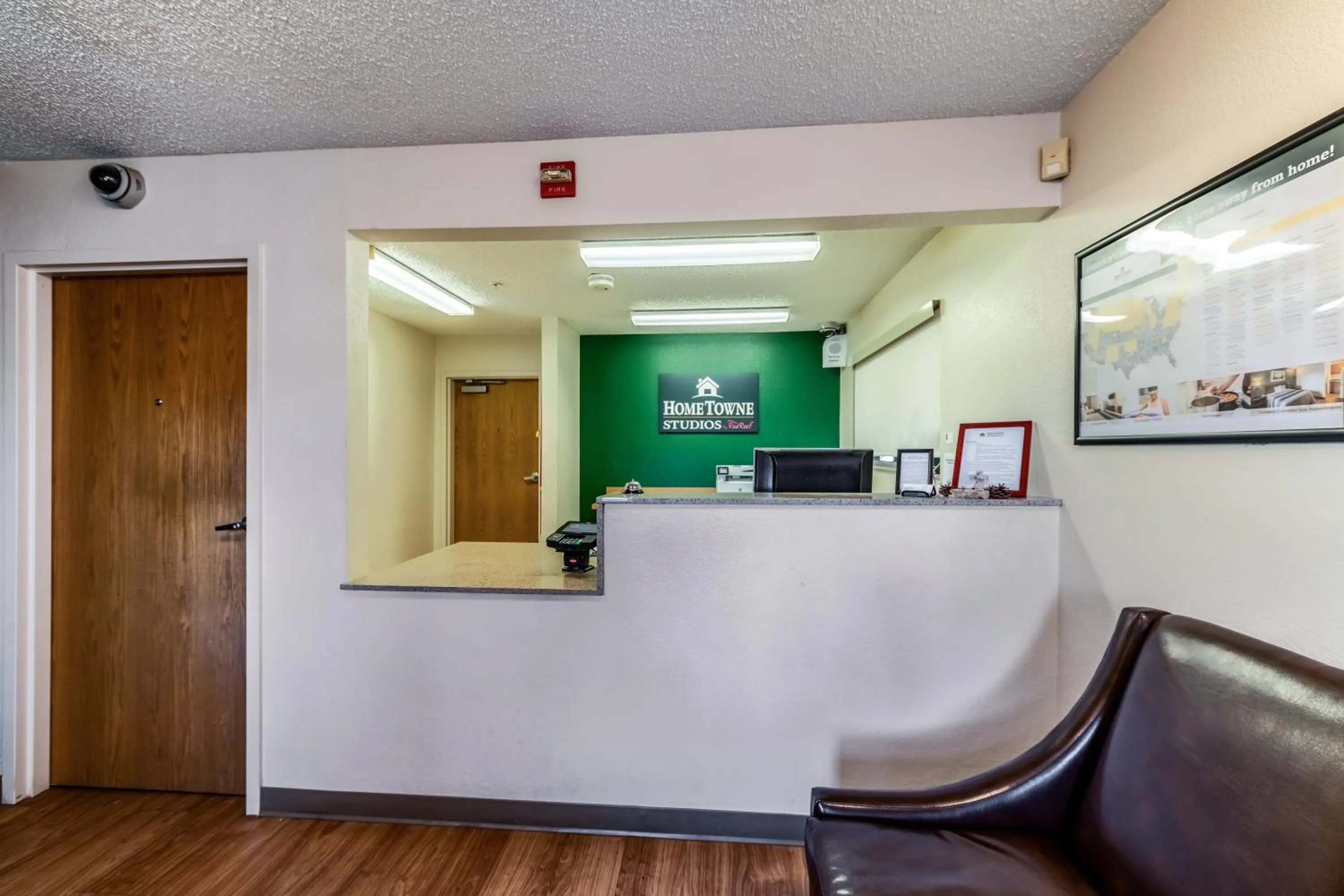 Lobby or reception in HomeTowne Studios by Red Roof Austin