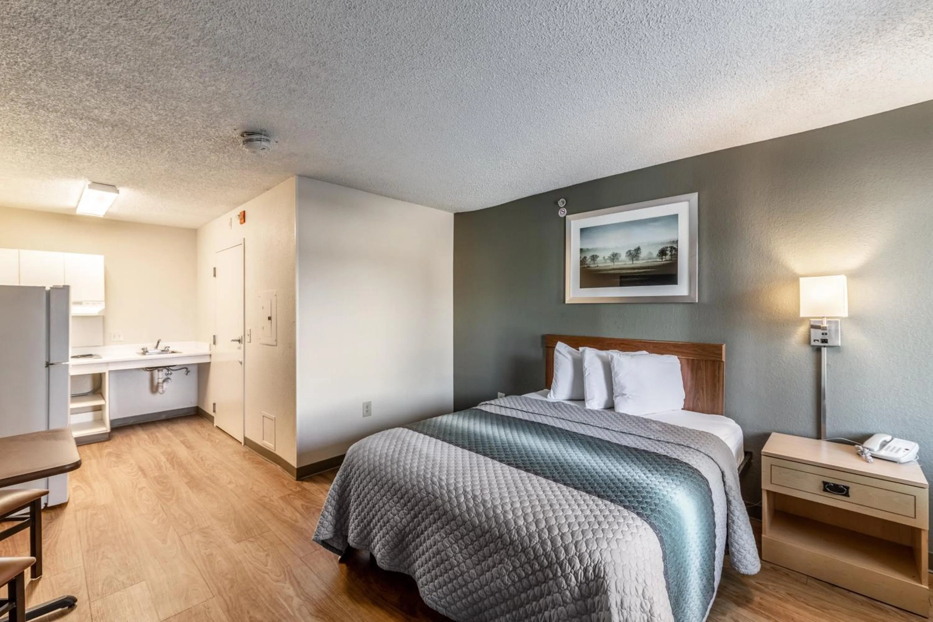 Photo of the whole room, Bed in HomeTowne Studios by Red Roof Austin