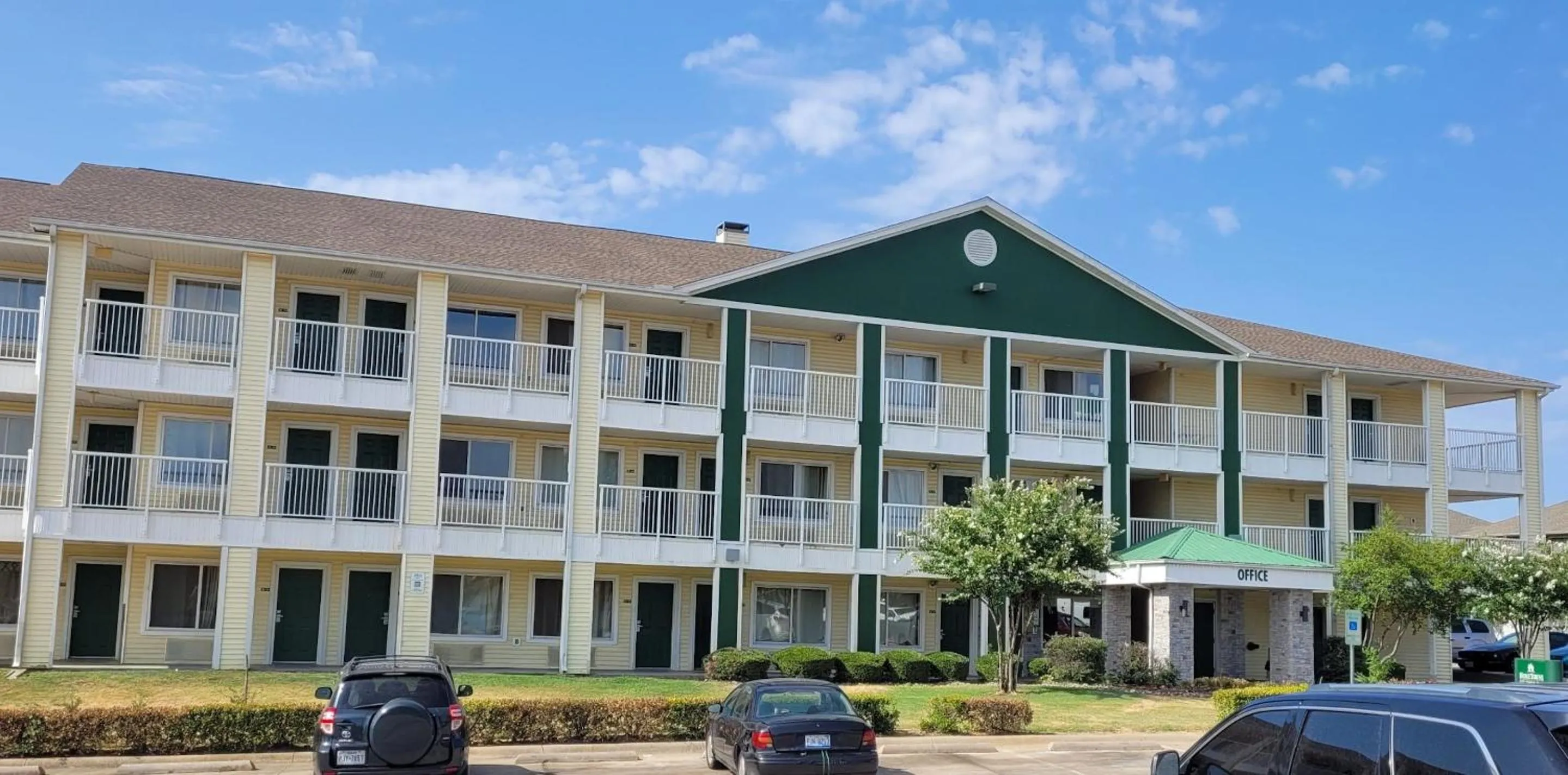 Property building in HomeTowne Studios by Red Roof Dallas - Irving