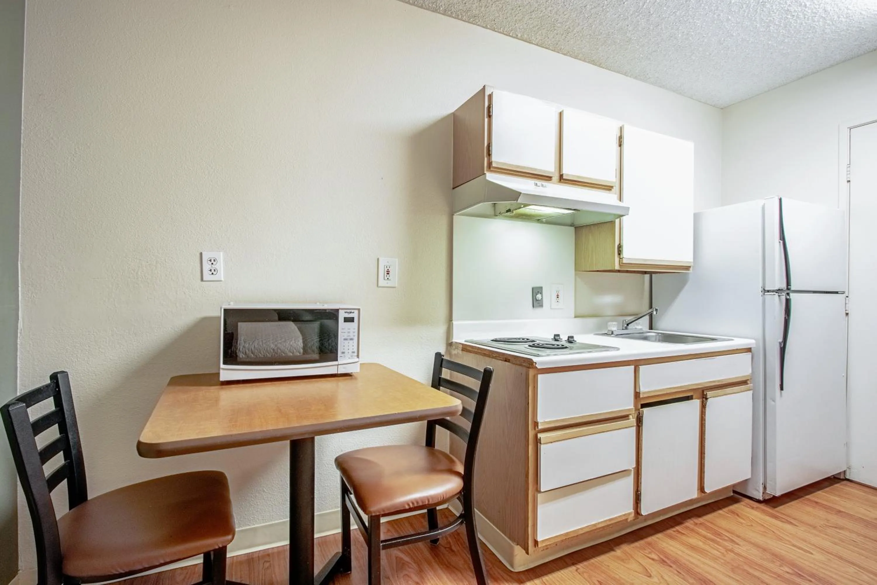 Photo of the whole room in HomeTowne Studios by Red Roof Phoenix - Dunlap Ave