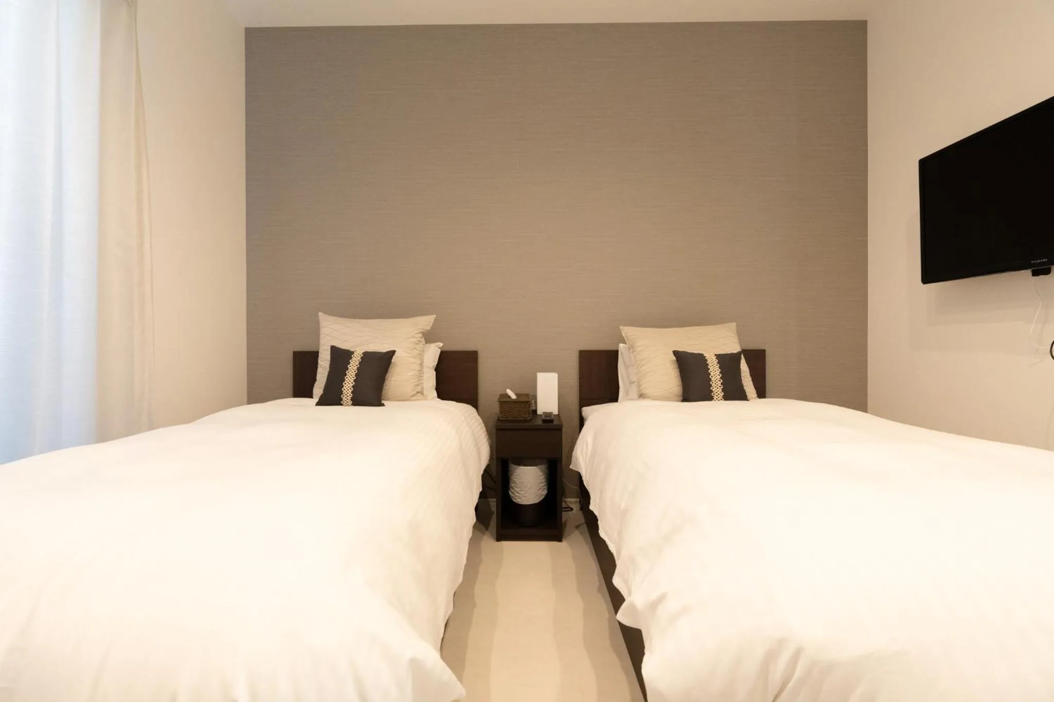 Bed in Jacuzzi Terrace Okinawa IMS