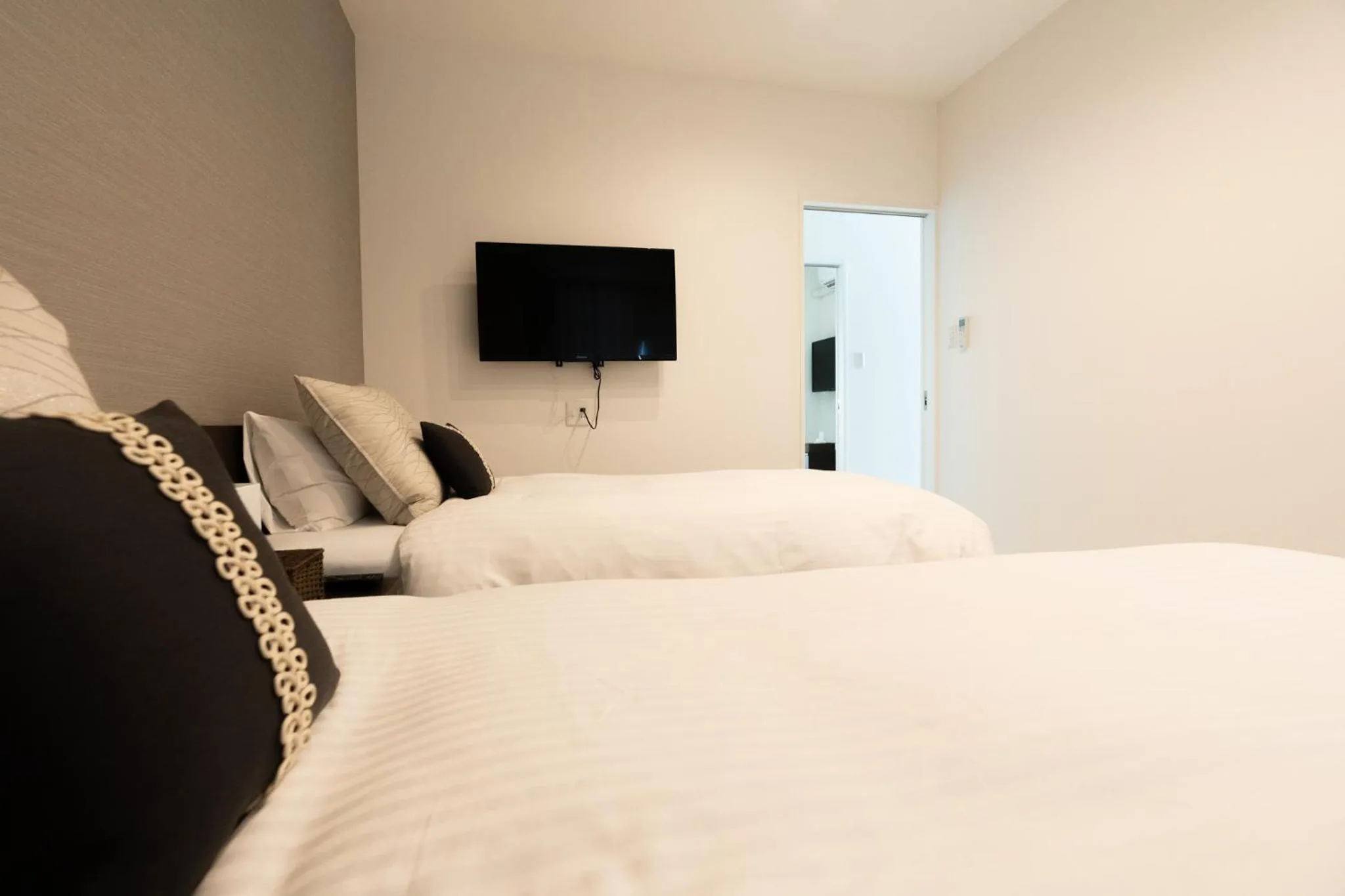 Bed in Jacuzzi Terrace Okinawa IMS