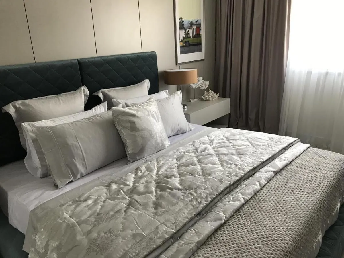 Bed in Levante Holiday Apartments