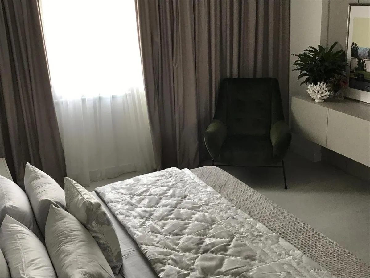 Bed in Levante Holiday Apartments