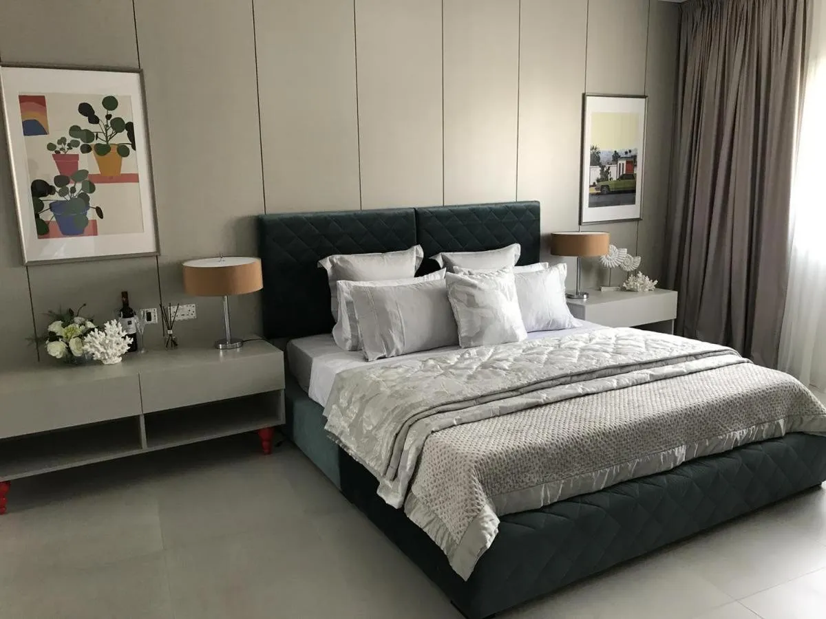 Bed in Levante Holiday Apartments