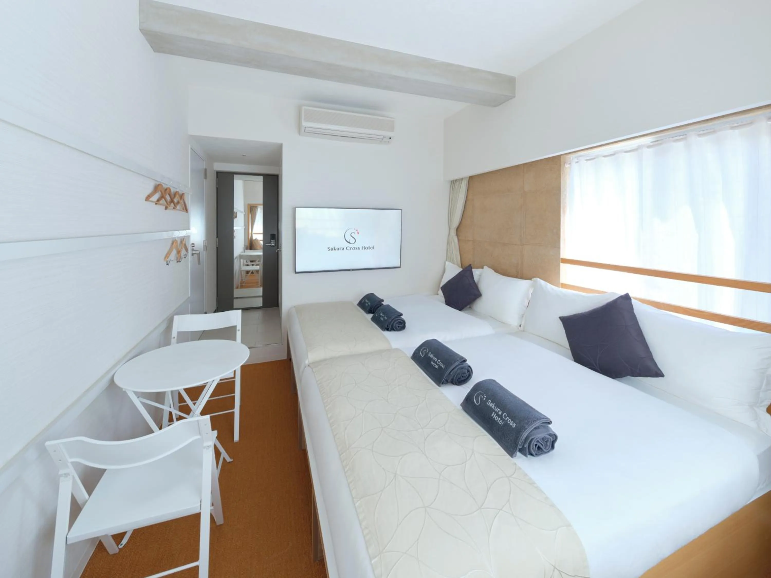 Bed in Sakura Cross Hotel Ueno Okachimachi