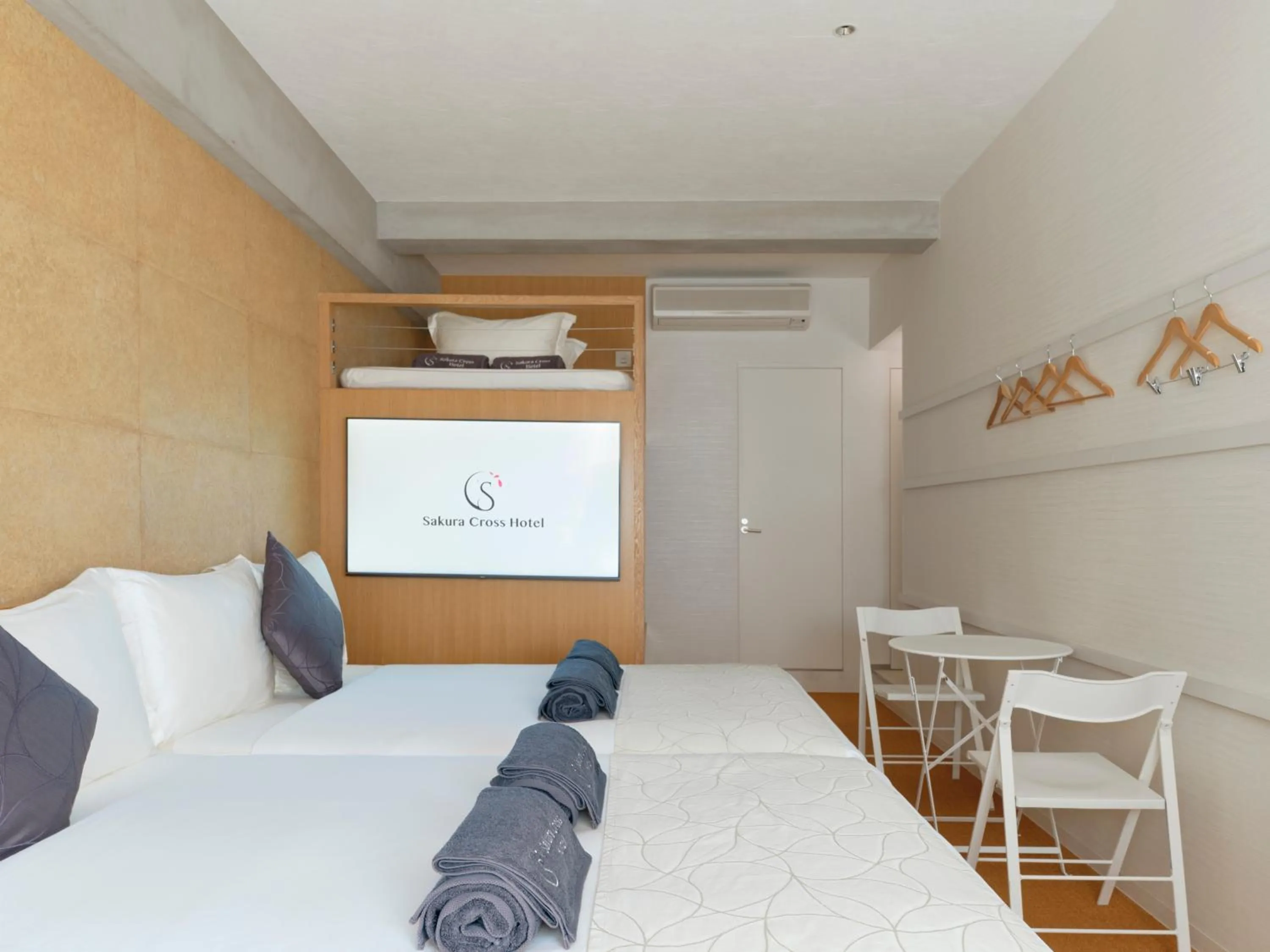 Bed in Sakura Cross Hotel Ueno Okachimachi