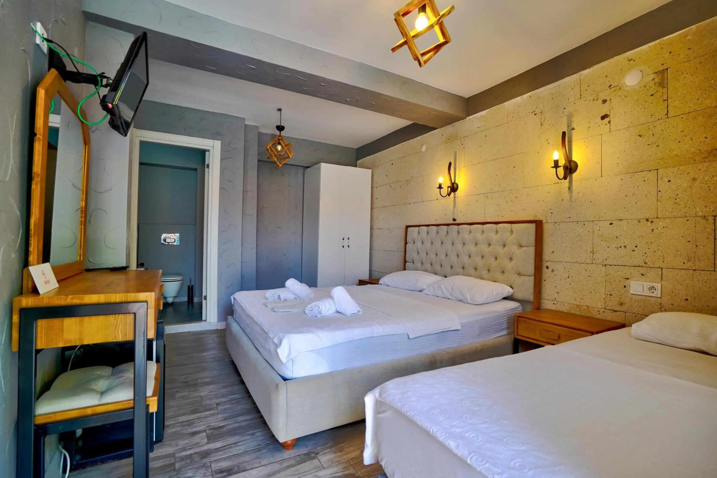 Bed in La Mira Suites